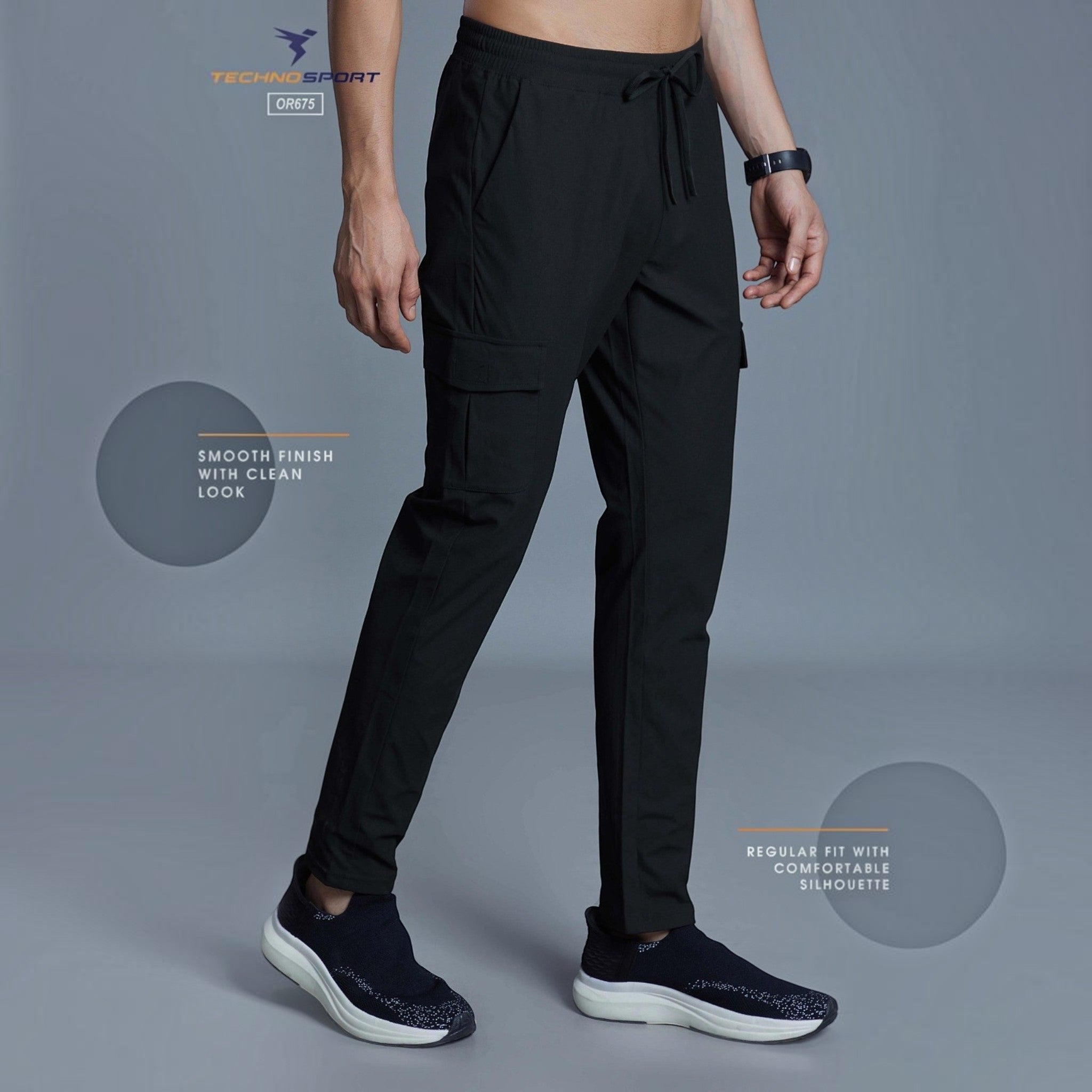 City Center Technosport OR675 black tapered track pants with cargo pockets and elastic drawstring waist on a model
