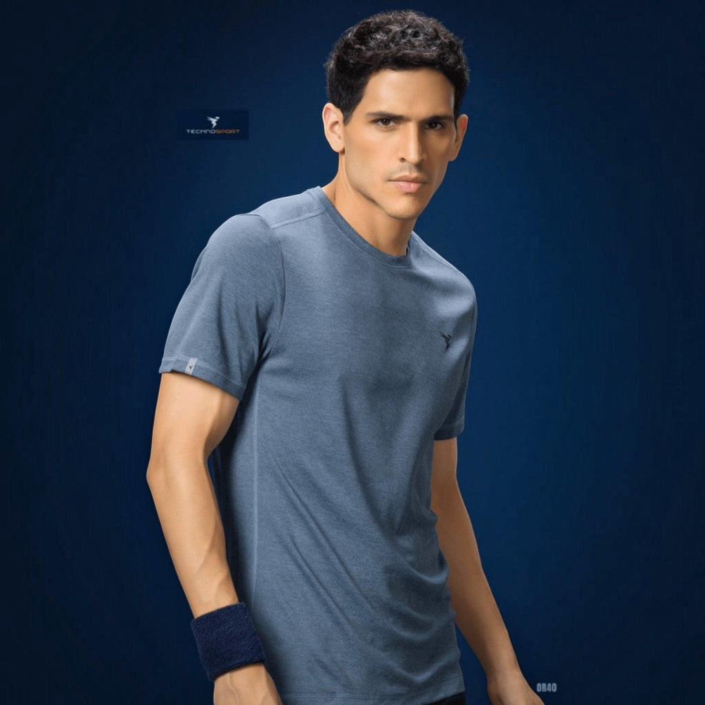 City Center Technosport athletic slim fit crew neck t-shirt in blue with moisture-wicking cooling fabric on a model