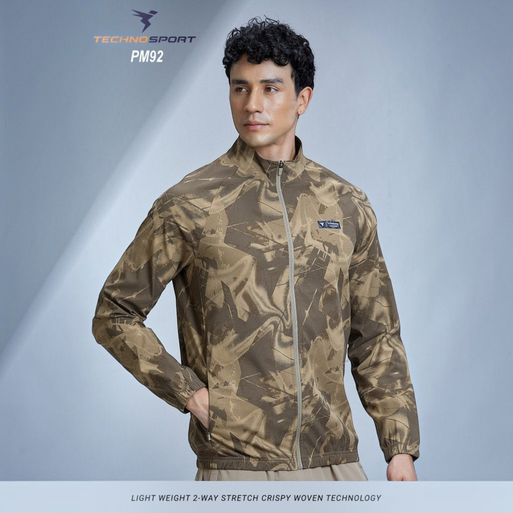 City Center Technosport brown all-over print high-neck full-sleeve jacket with odour-free technology on a male model
