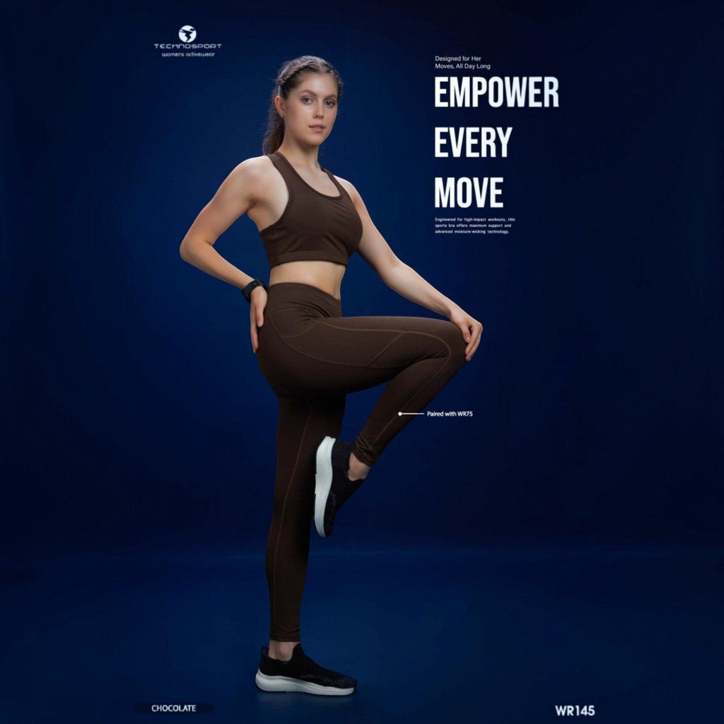 City Center Technosport Elastoplus chocolate brown racer back sports bra worn by a model in a fitness pose