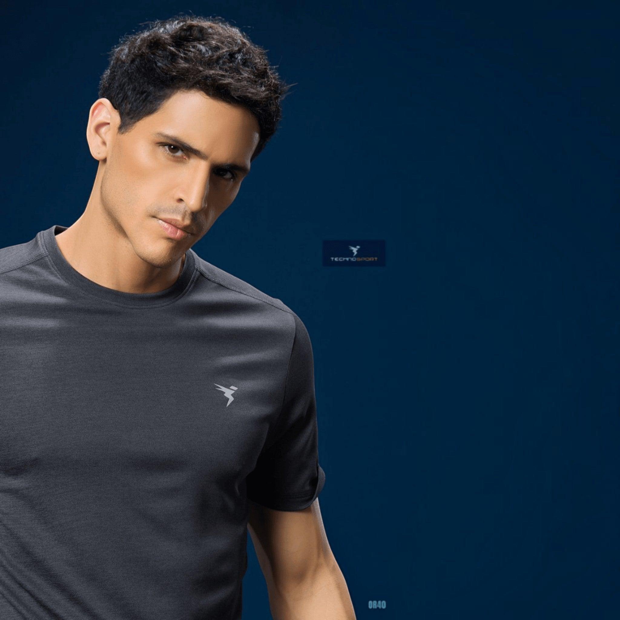 City Center Technosport charcoal grey athletic crew neck t-shirt with moisture-wicking fabric worn by a male model.