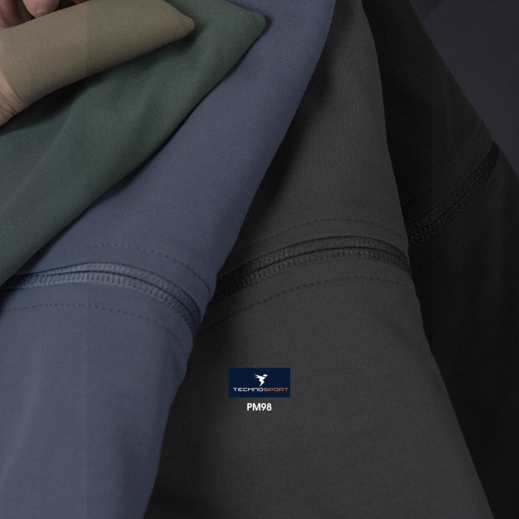 City Center Technosport DuraCool+ moisture-wicking fabric swatches in olive, blue, charcoal, and black.