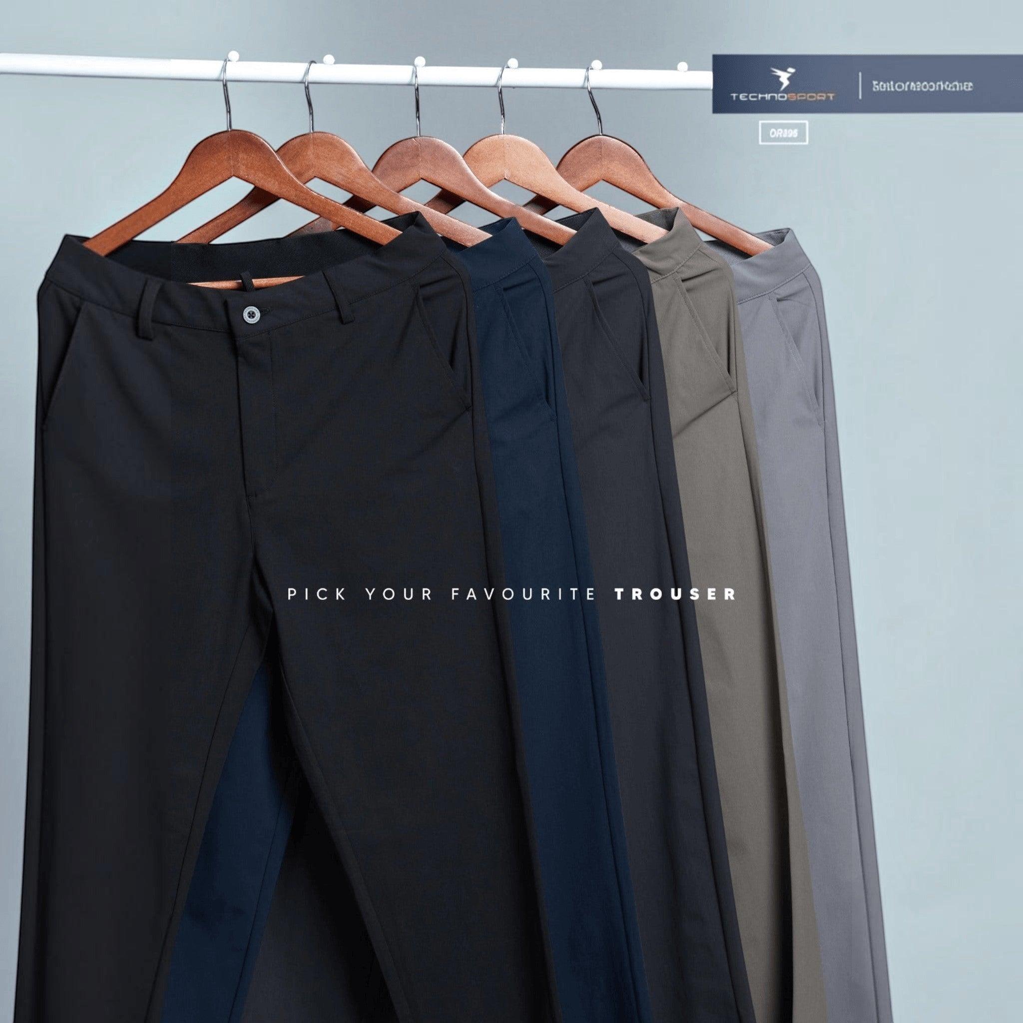 City Center Technosport DuraCool+ formal pants in various solid colours hanging on wooden hangers.