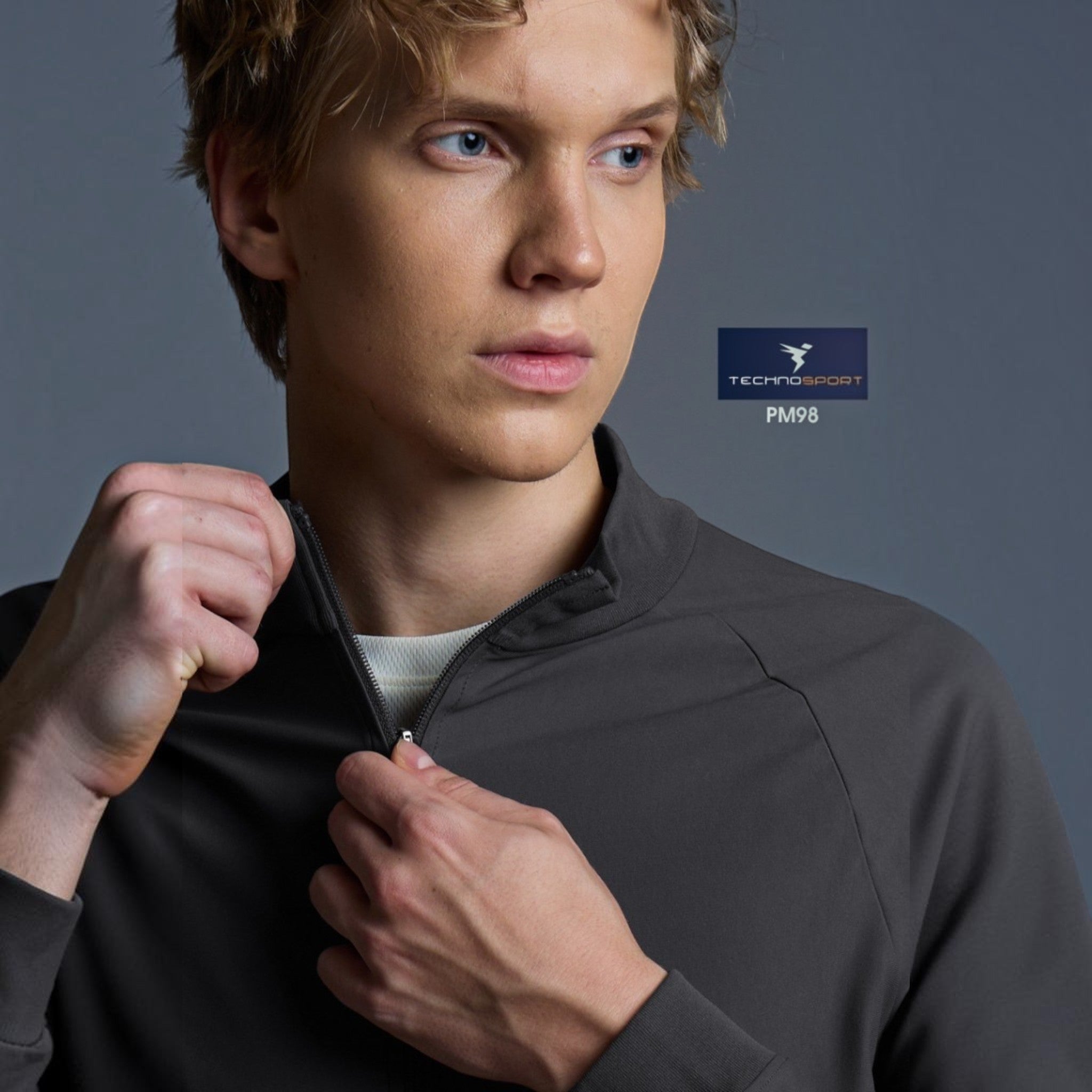 City Center Technosport DuraCool+ solid grey high-neck jacket with moisture-wicking fabric on a male model