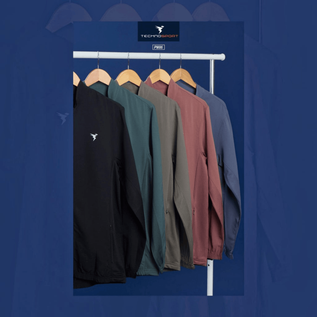 City Center Technosport TS Flexi PM86 jackets in various colors hanging on a rack, featuring stretchable tech fabric.