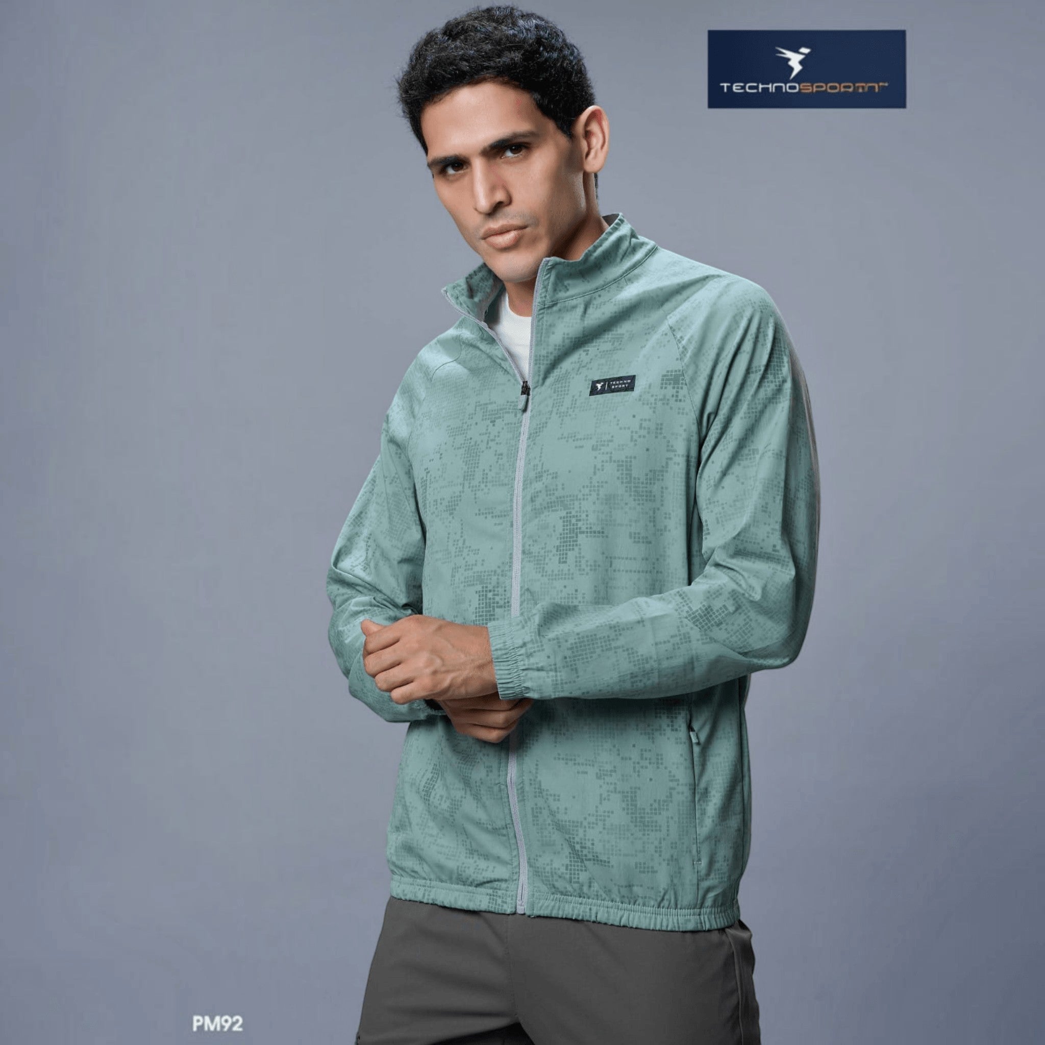 City Center Technosport men's sage green hi-neck athletic jacket with all-over print and full-zip closure