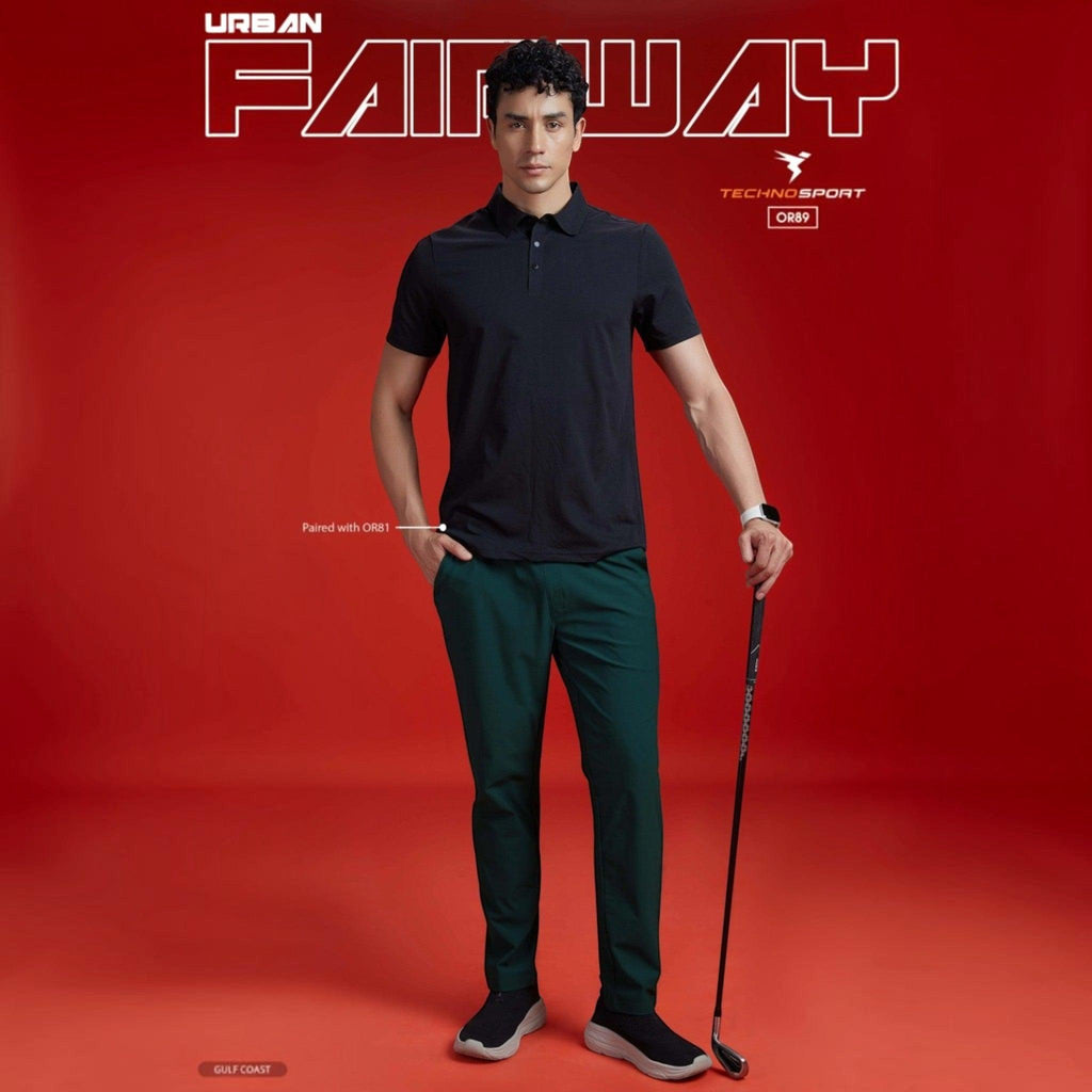 City Center model wearing Technosport DuraCool+ dark green 4-way stretch track pants with a black polo shirt