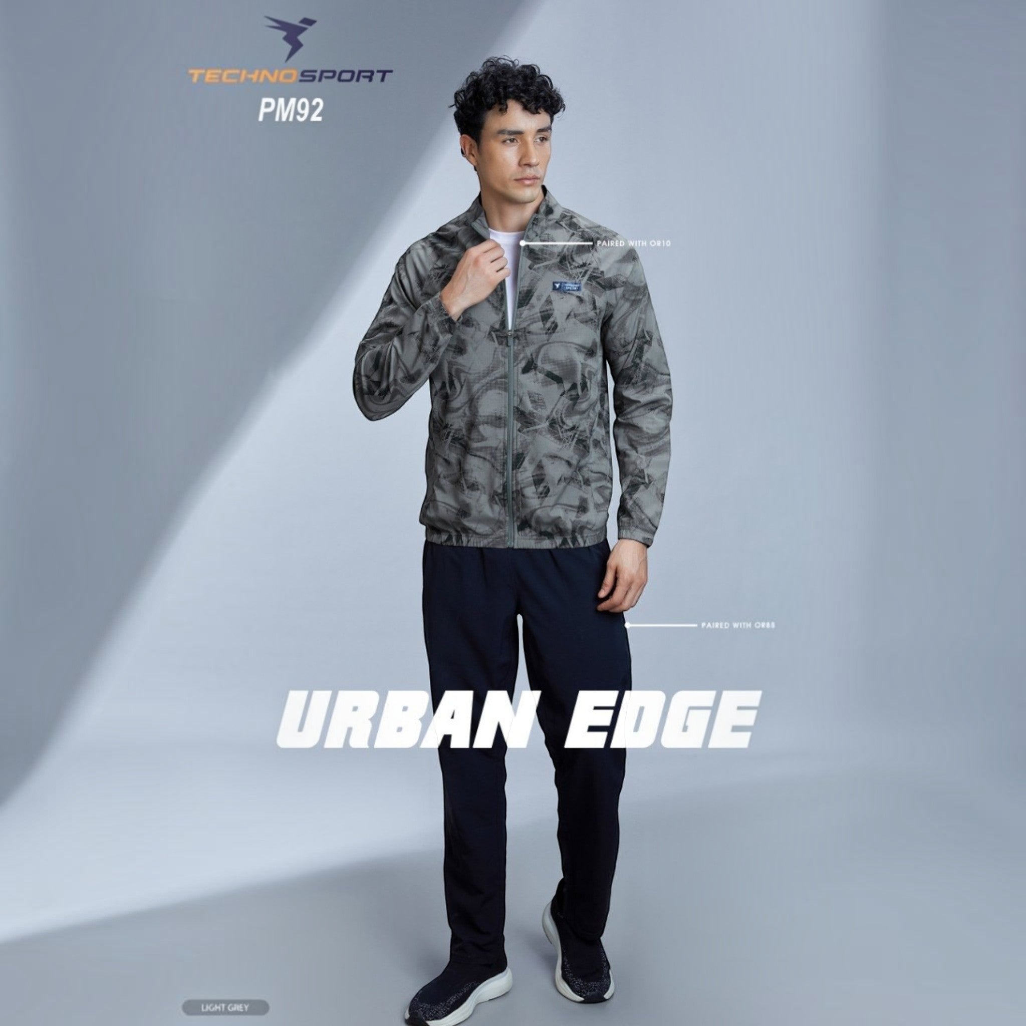 City Center Technosport grey all-over print hi-neck jacket with full sleeves worn by a male model