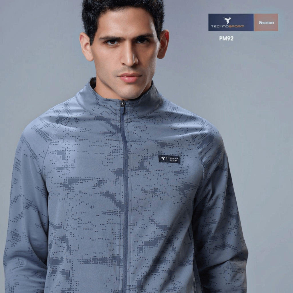 City Center Technosport men's grey hi-neck jacket with a digital camo print, full zipper, and moisture-wicking fabric.