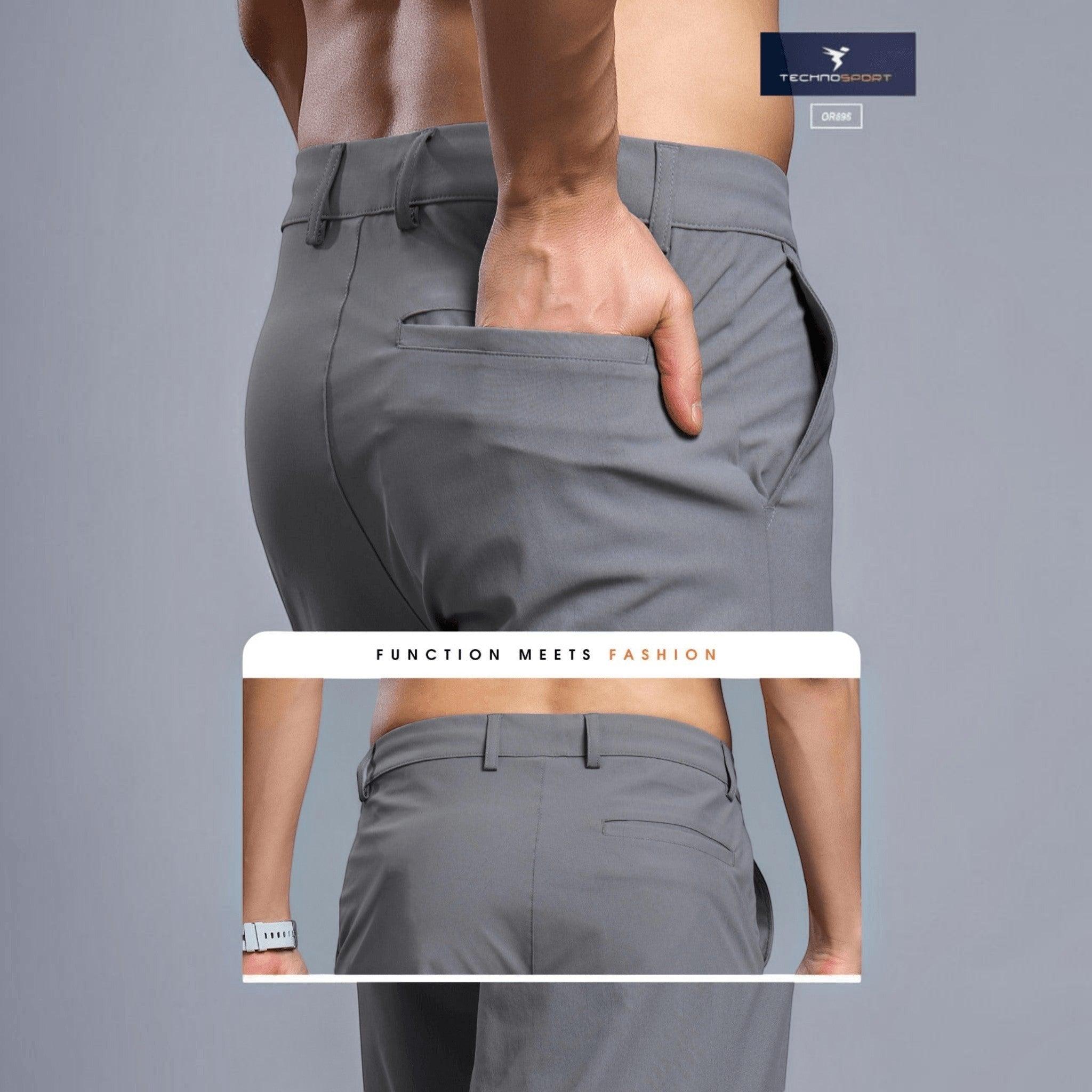 City Center Technosport DuraCool+ grey regular fit formal pants with 4-way stretch fabric and back pocket detail.