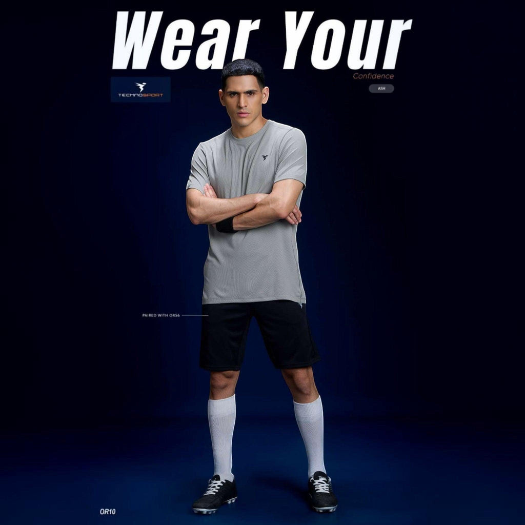 City Center model wearing a grey Technosport crew neck slim fit performance t-shirt with half sleeves