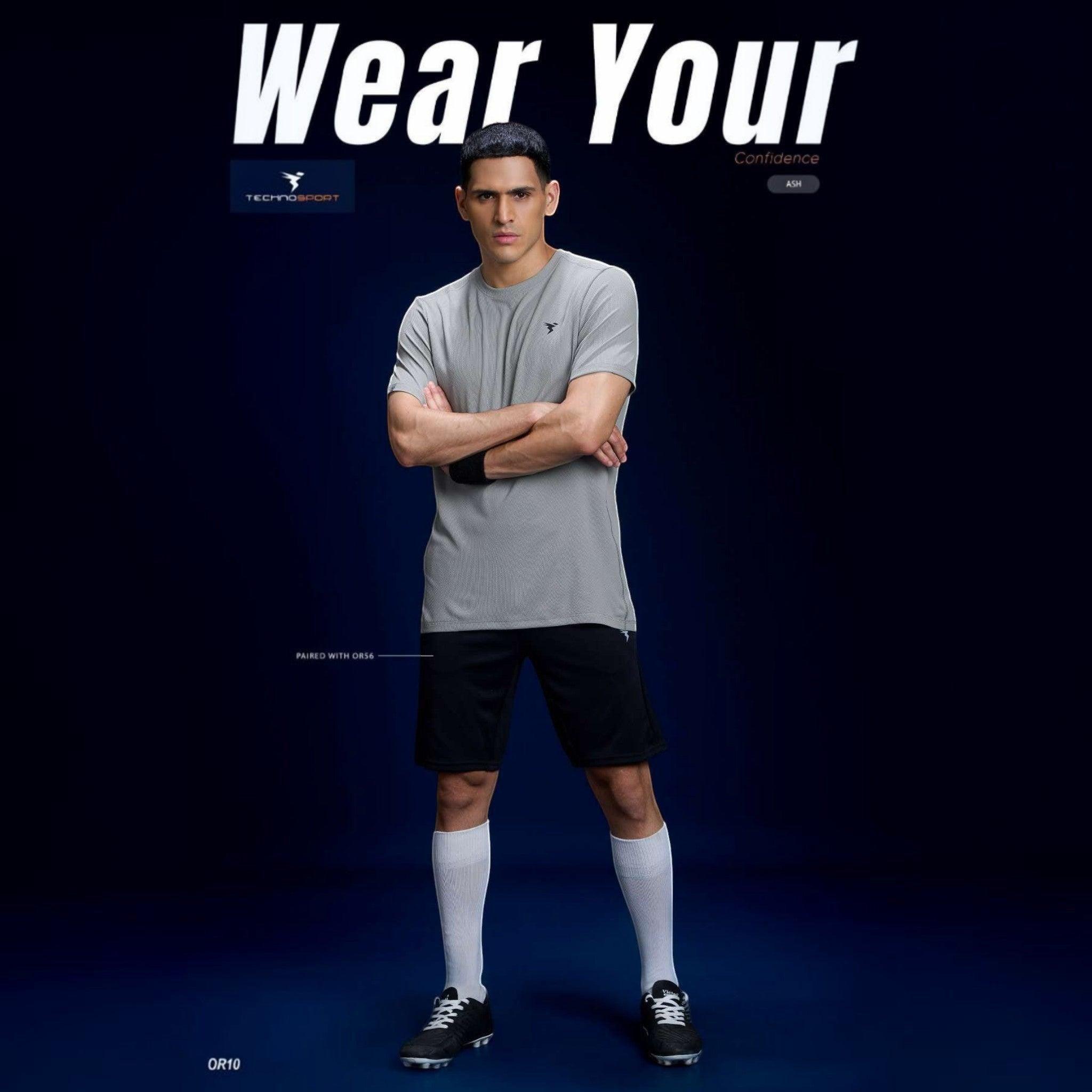 City Center model wearing a grey Technosport crew neck slim fit performance t-shirt with half sleeves