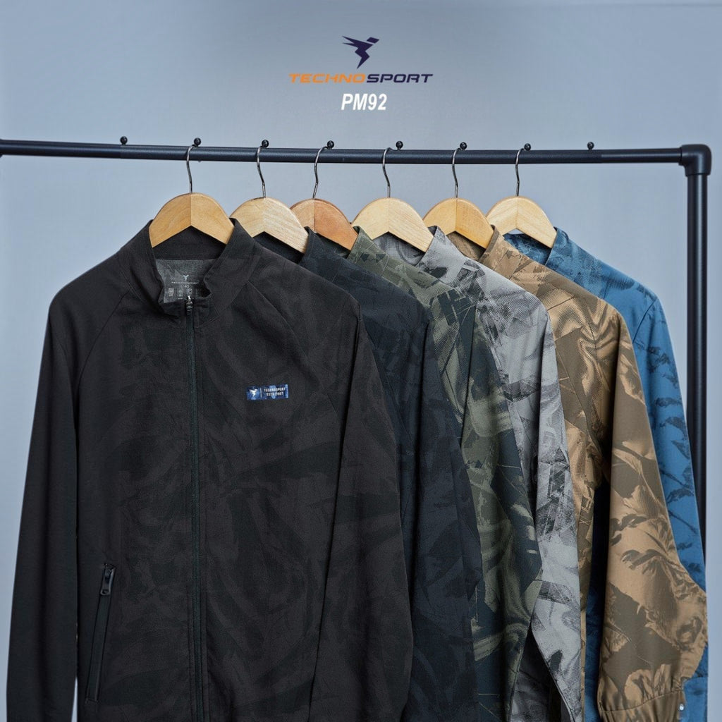 City Center Technosport full-sleeve hi-neck jackets with all-over print in various colours on a clothing rack