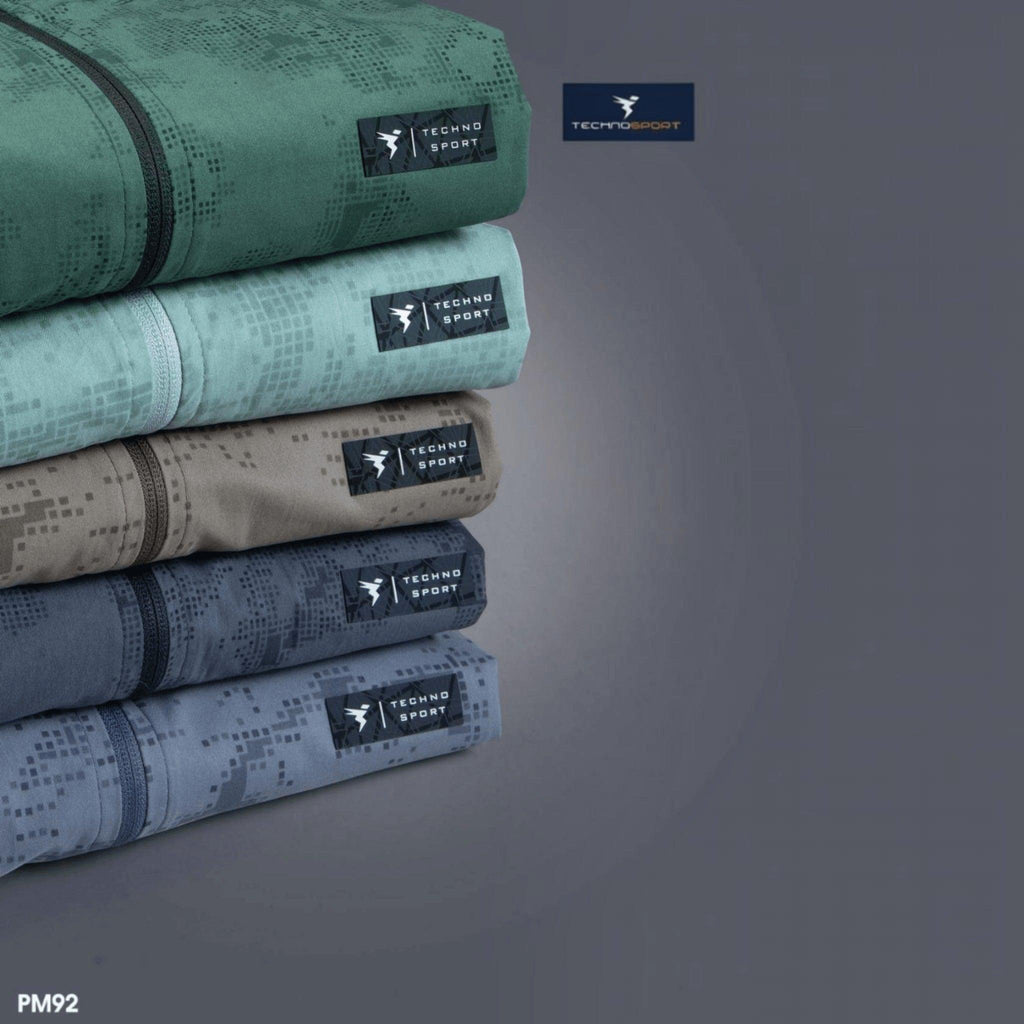 City Center Technosport men's hi-neck stretch jackets in a stack of five assorted solid and AOP colours