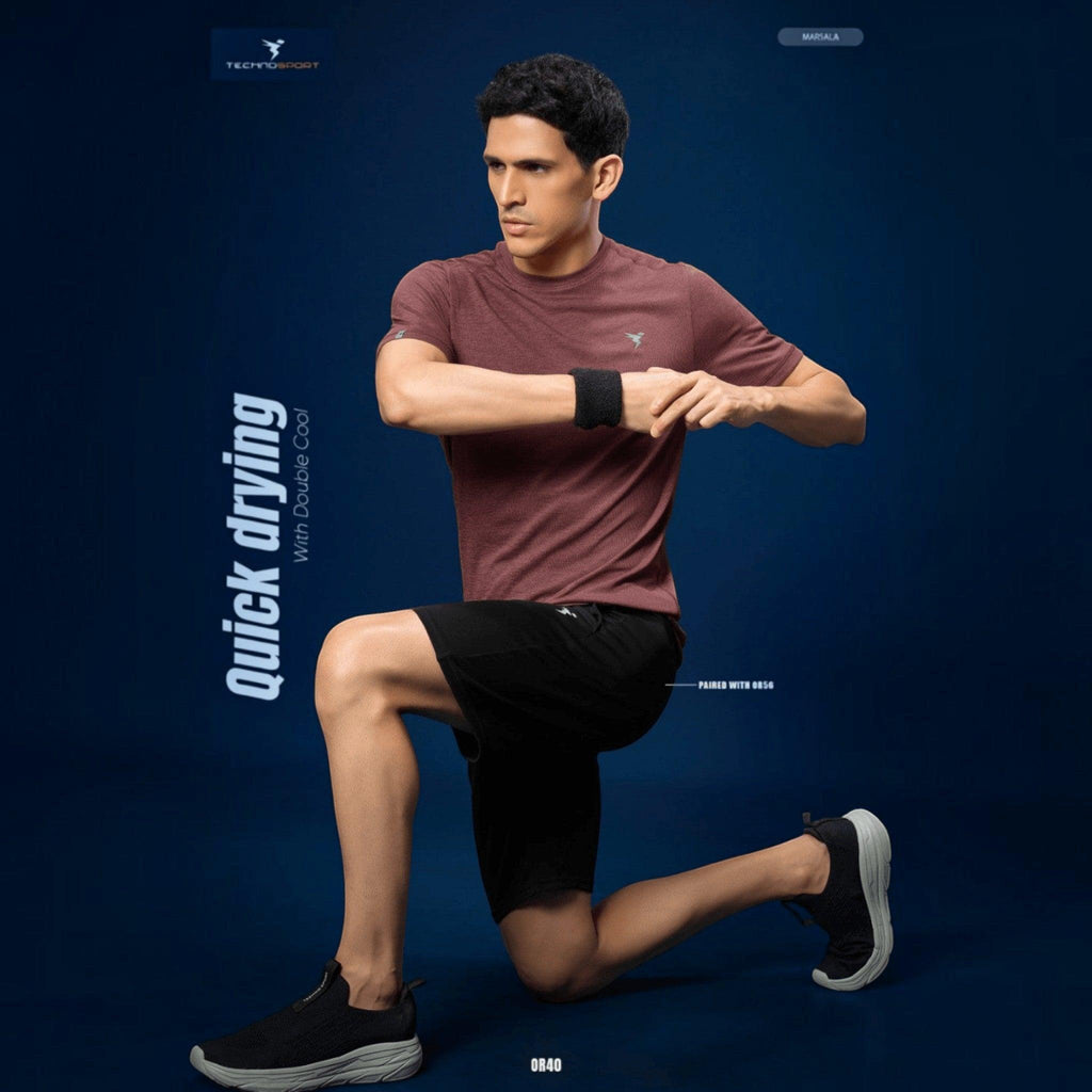 City Center Technosport marsala crew neck athletic t-shirt with moisture-wicking fabric worn by a male athlete
