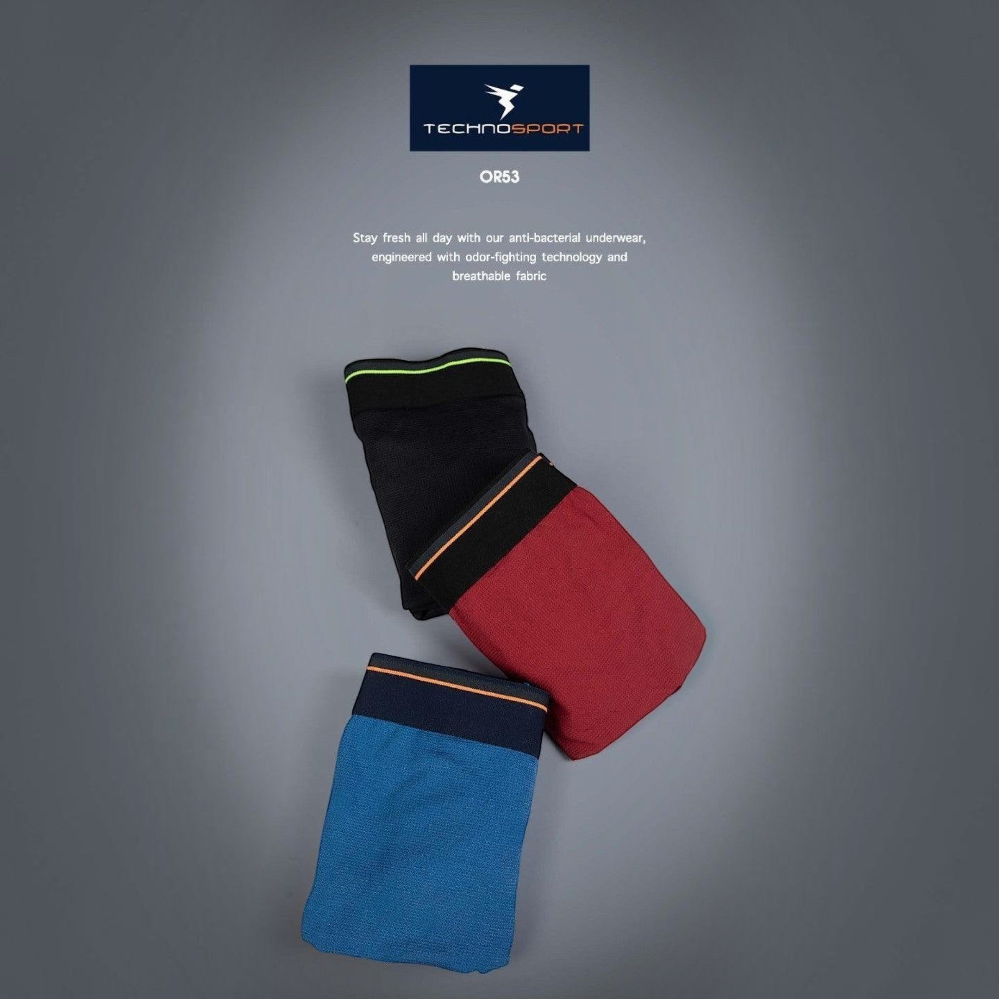 City Center Technosport OR53 men's athletic trunks in black, red, and blue with breathable 4-way stretch mesh fabric.
