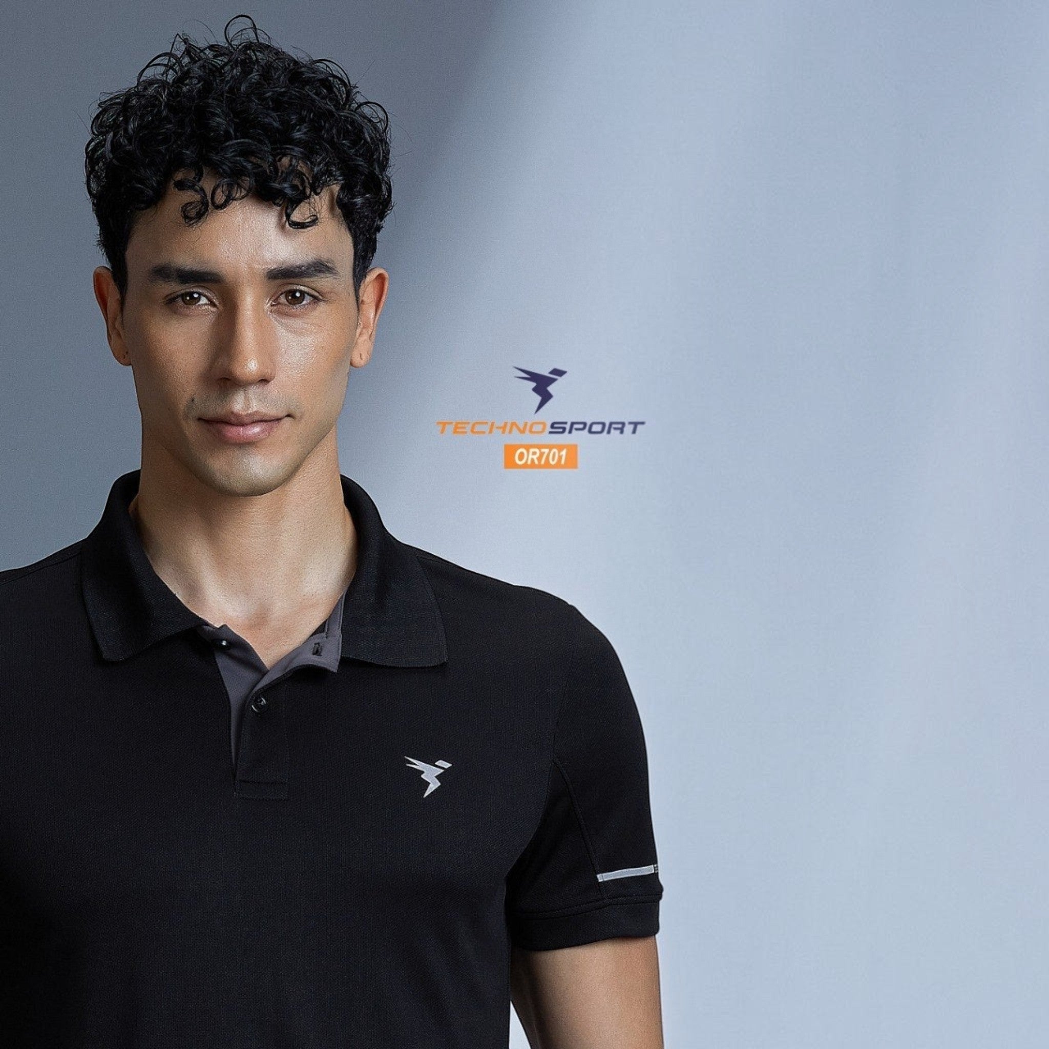 City Center OR701 Technosport men's black performance polo shirt with moisture-wicking fabric on a male model