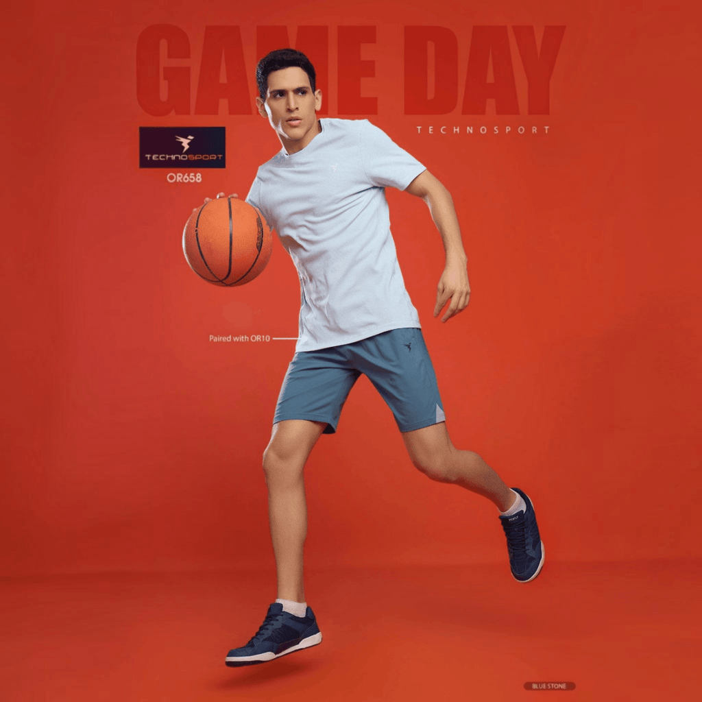 City Center Technosport men wearing blue 4-way stretch crispy shorts and t-shirt while playing basketball