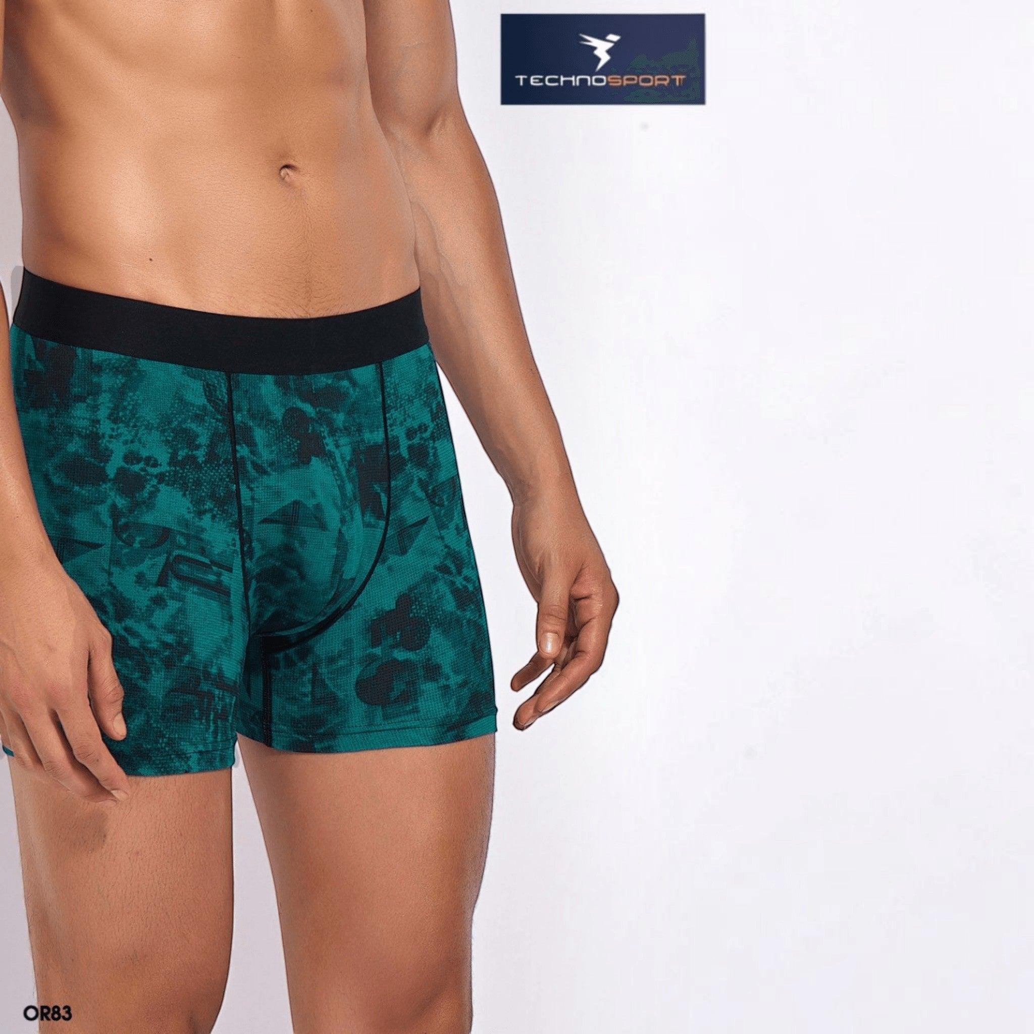 City Center Technosport Men’s Trunk OR83 in green with black abstract print and a comfortable elastic waistband.