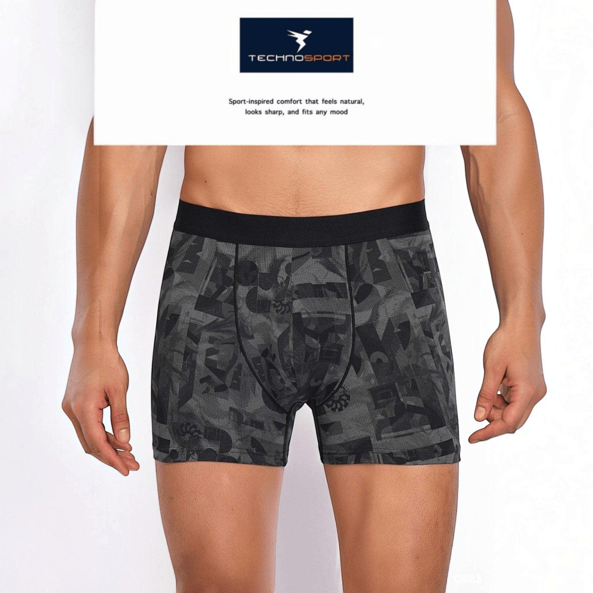 City Center Technosport men's trunk in grey with an all-over geometric print, featuring a soft black waistband.