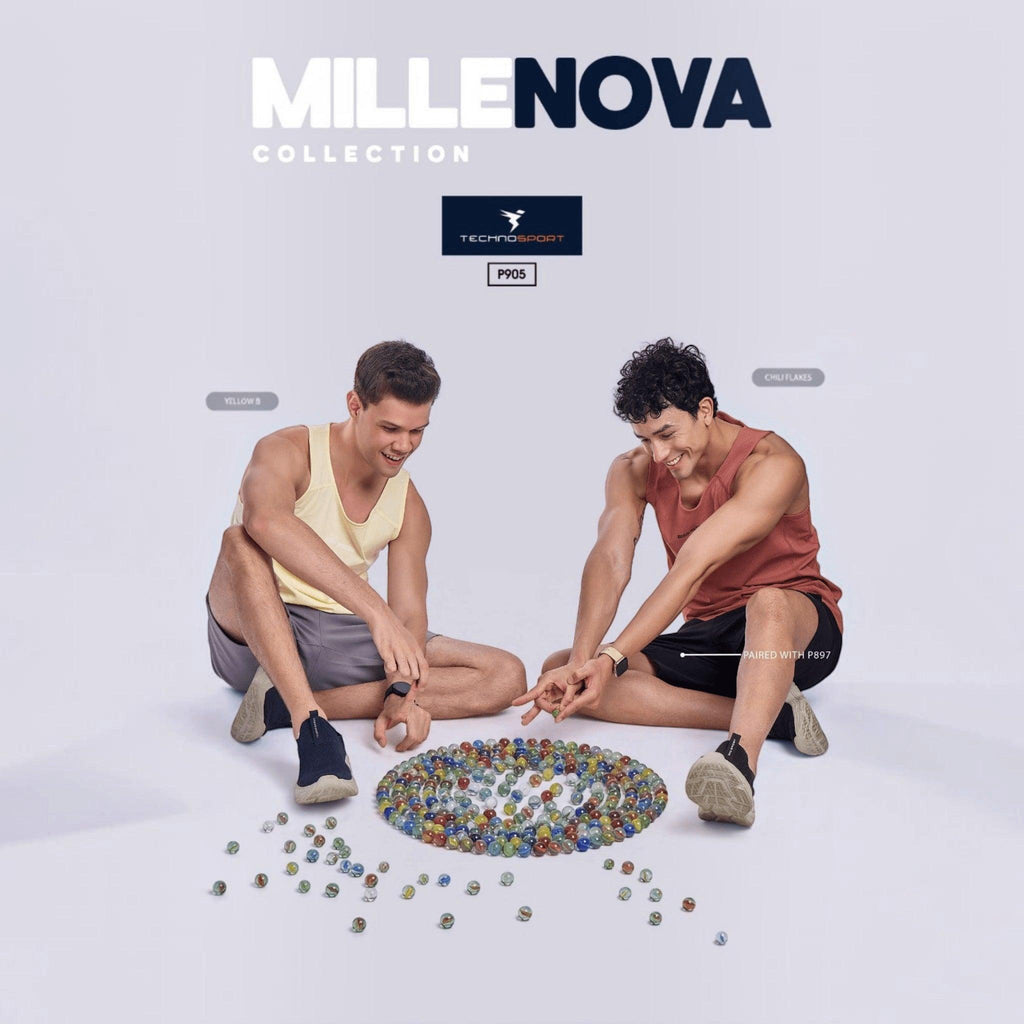 City Center TECHNOSPORT Millenova sleeveless athletic tank tops in yellow and chili flakes worn by two men playing marbles