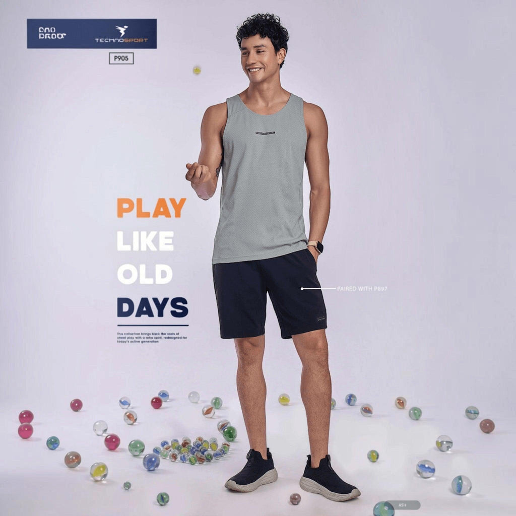 City Center TECHNOSPORT Millenova sleeveless athletic tank top in ash grey, worn by a smiling man with black shorts.