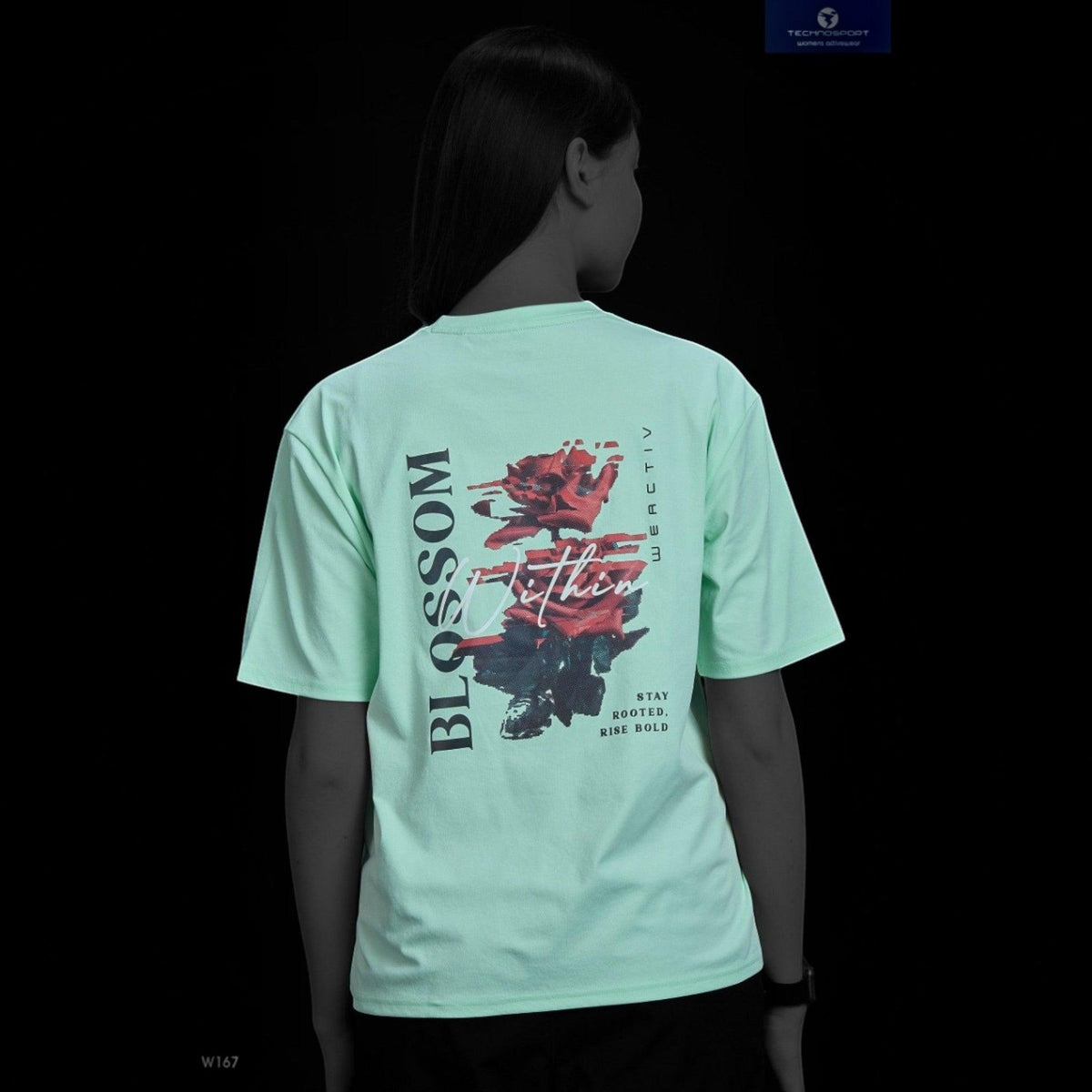 City Center Technosport women's mint green crew neck t-shirt with a bold red floral graphic on the back