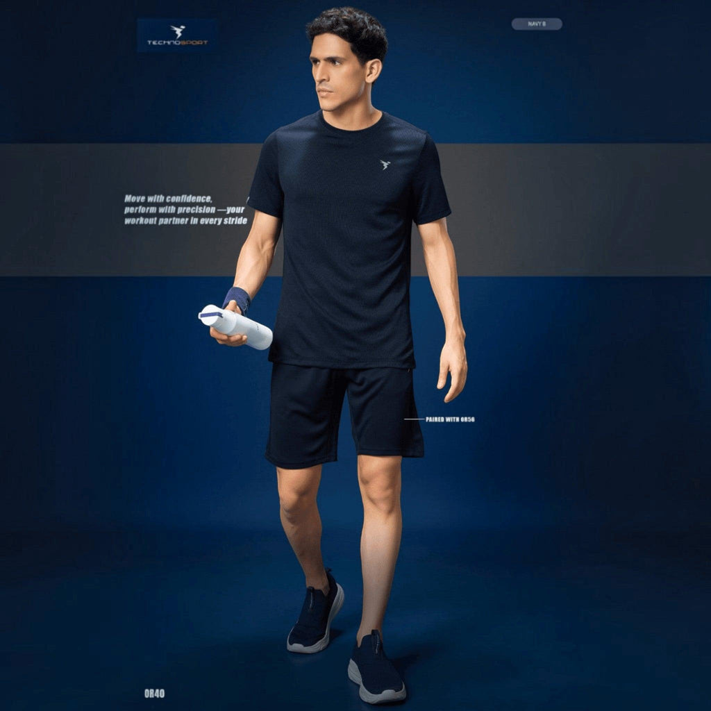 City Center Technosport navy blue athletic crew neck t-shirt with moisture-wicking performance fabric on a male model.