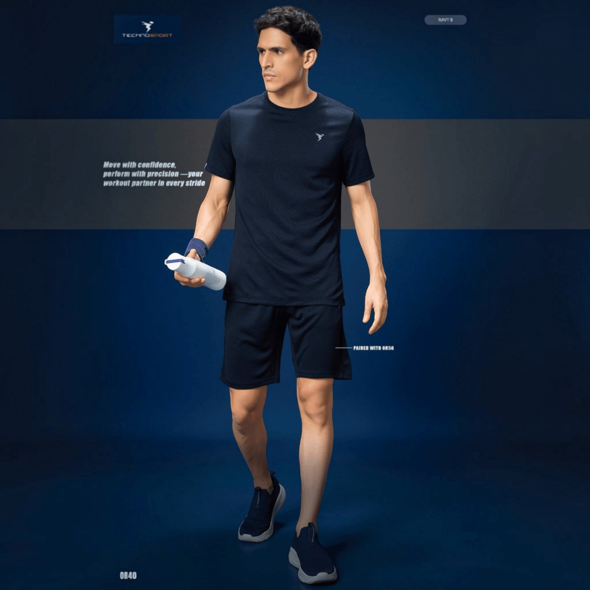 City Center Technosport navy blue athletic crew neck t-shirt with moisture-wicking performance fabric on a male model.