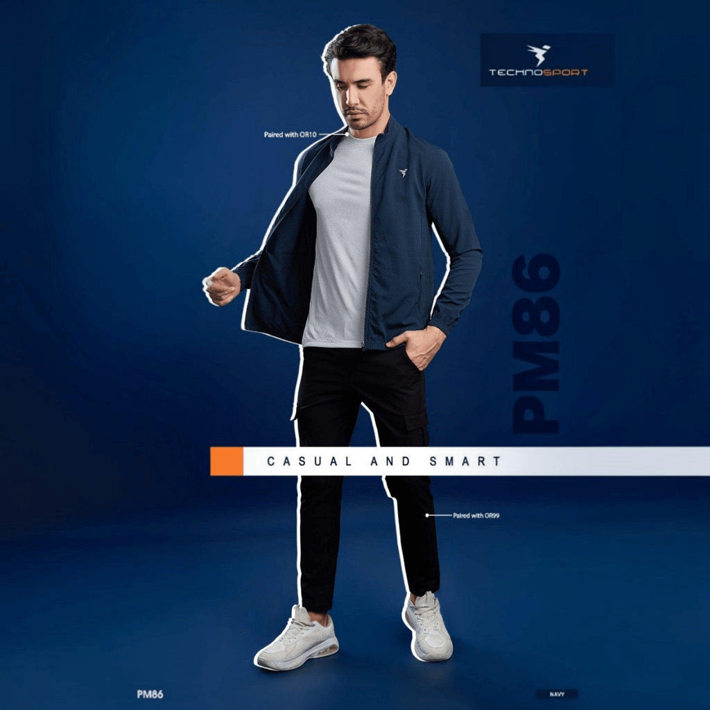 City Center model wearing a navy Technosport slim-fit hi-neck jacket over a grey t-shirt and black trousers
