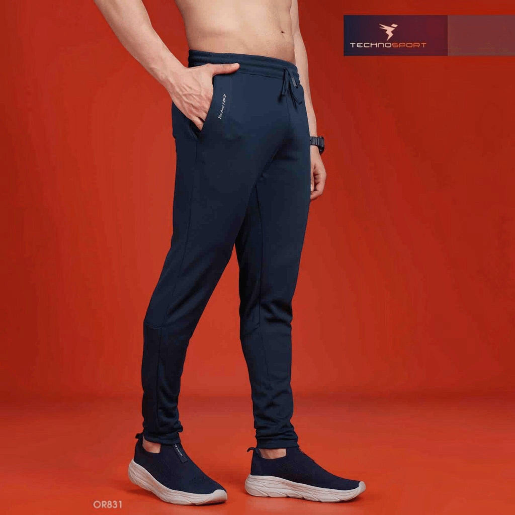City Center Technosport men's navy blue slim-fit performance track pants with moisture-wicking fabric and side pockets.