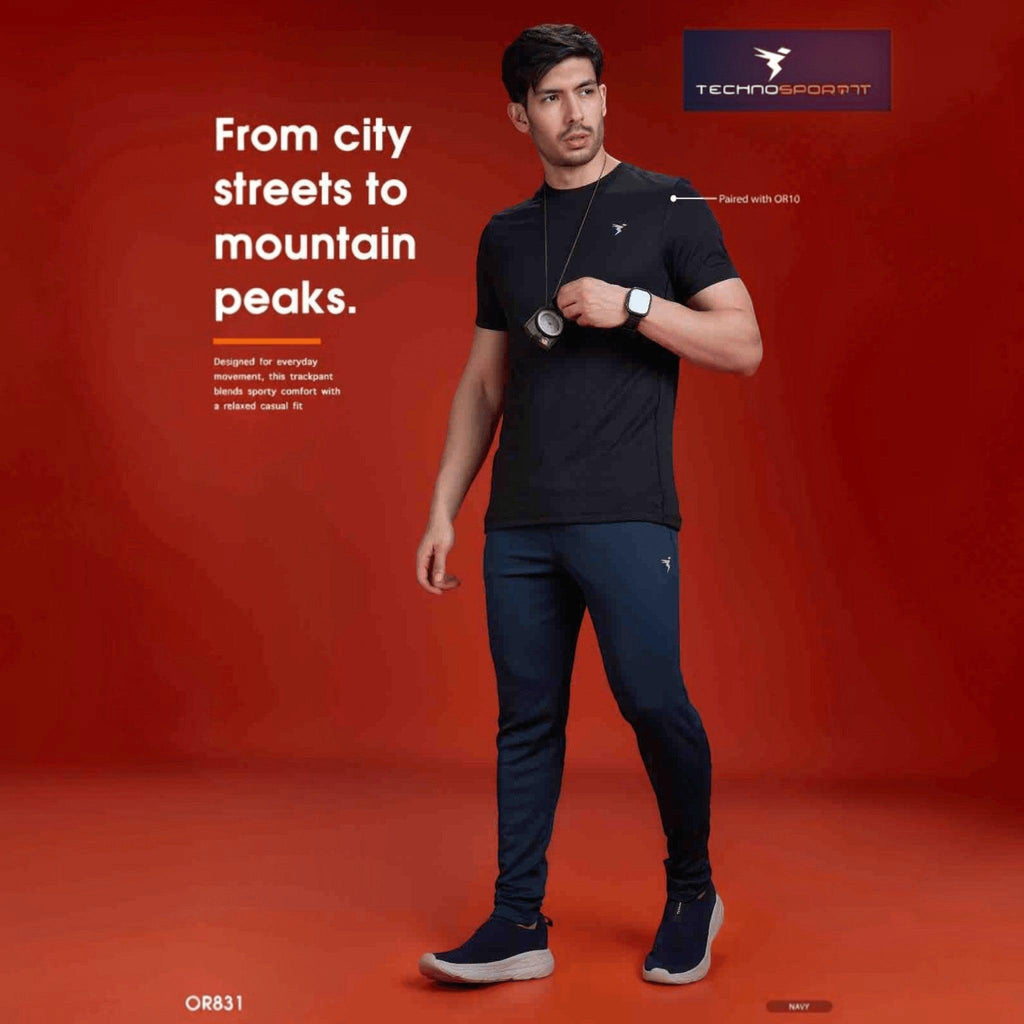 City Center Technosport men wearing navy blue slim-fit performance track pants with moisture-wicking fabric