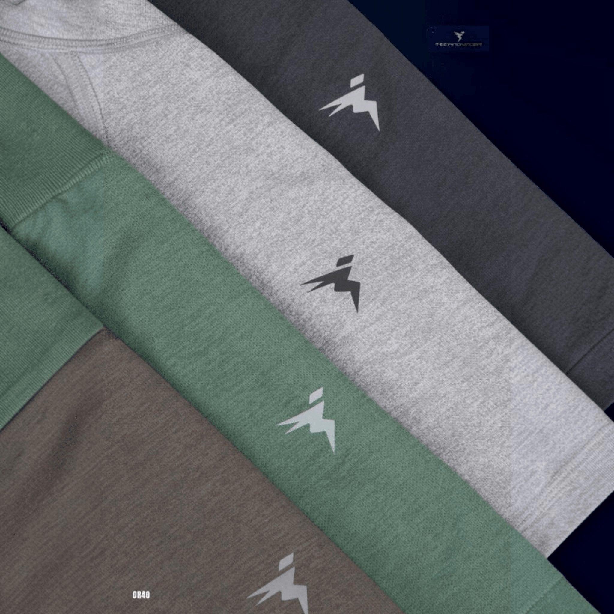 City Center Technosport athletic crew neck t-shirts in grey, green, and charcoal with moisture-wicking performance fabric.