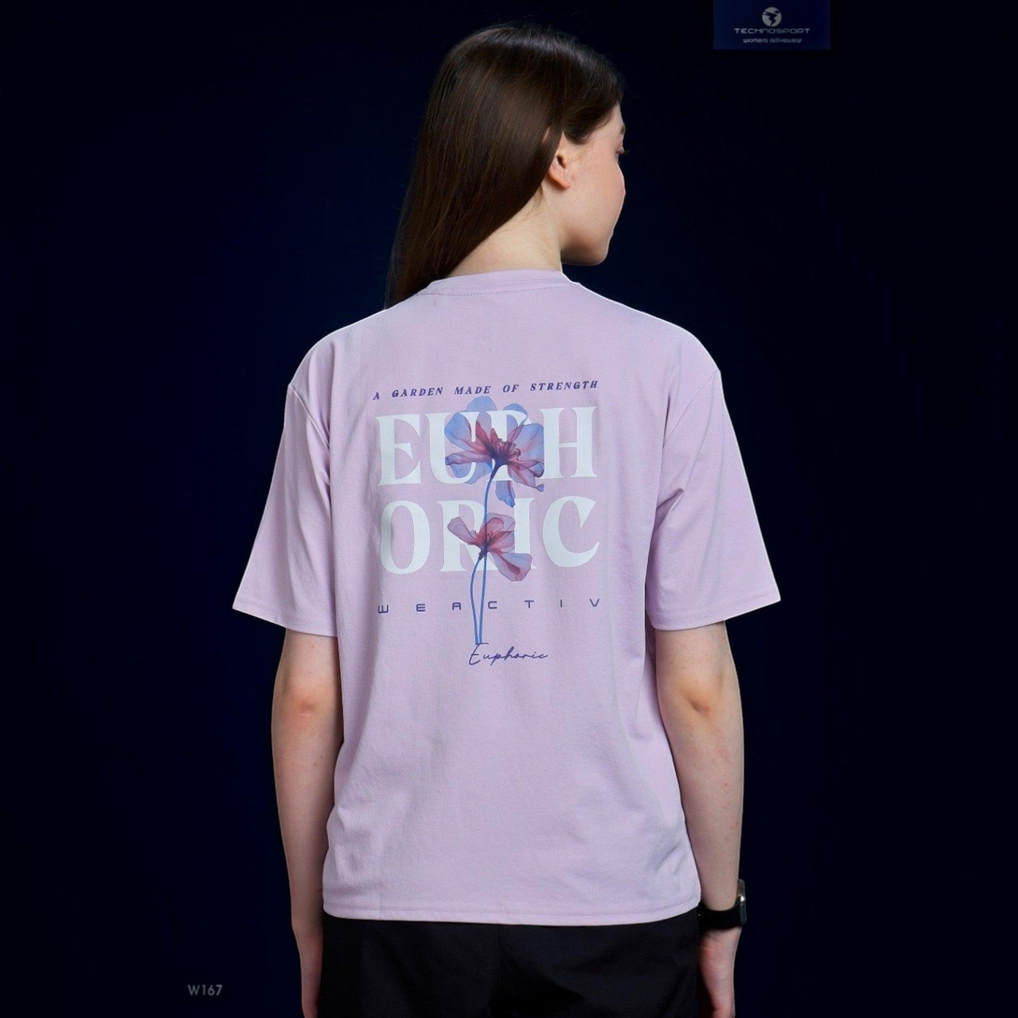City Center Technosport women's light purple crew neck t-shirt with a floral graphic on the back, worn by a model.