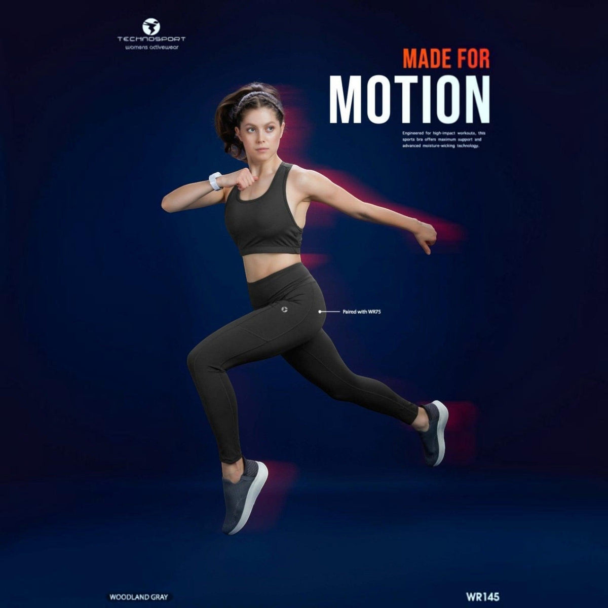 City Center Technosport Elastoplus racer back sports bra in woodland gray worn by a woman in a dynamic running pose