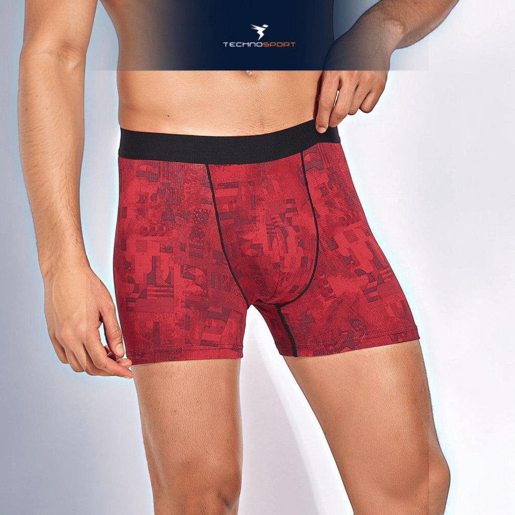 City Center Technosport men's red trunk with all-over print, featuring a black elastic waistband and performance fabric.
