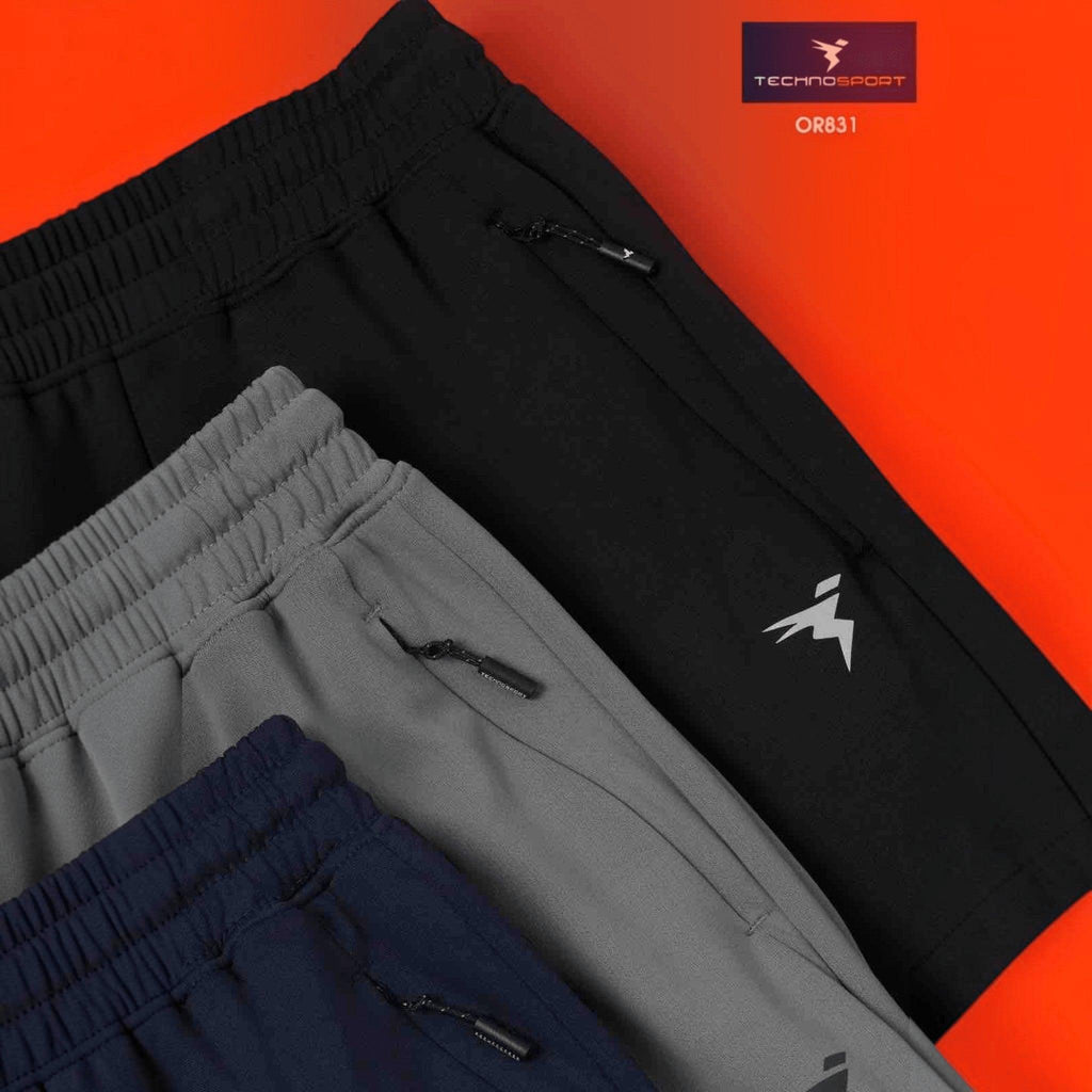 City Center Technosport slim fit track pants in black, grey, and navy with moisture-wicking fabric and zippered pockets.