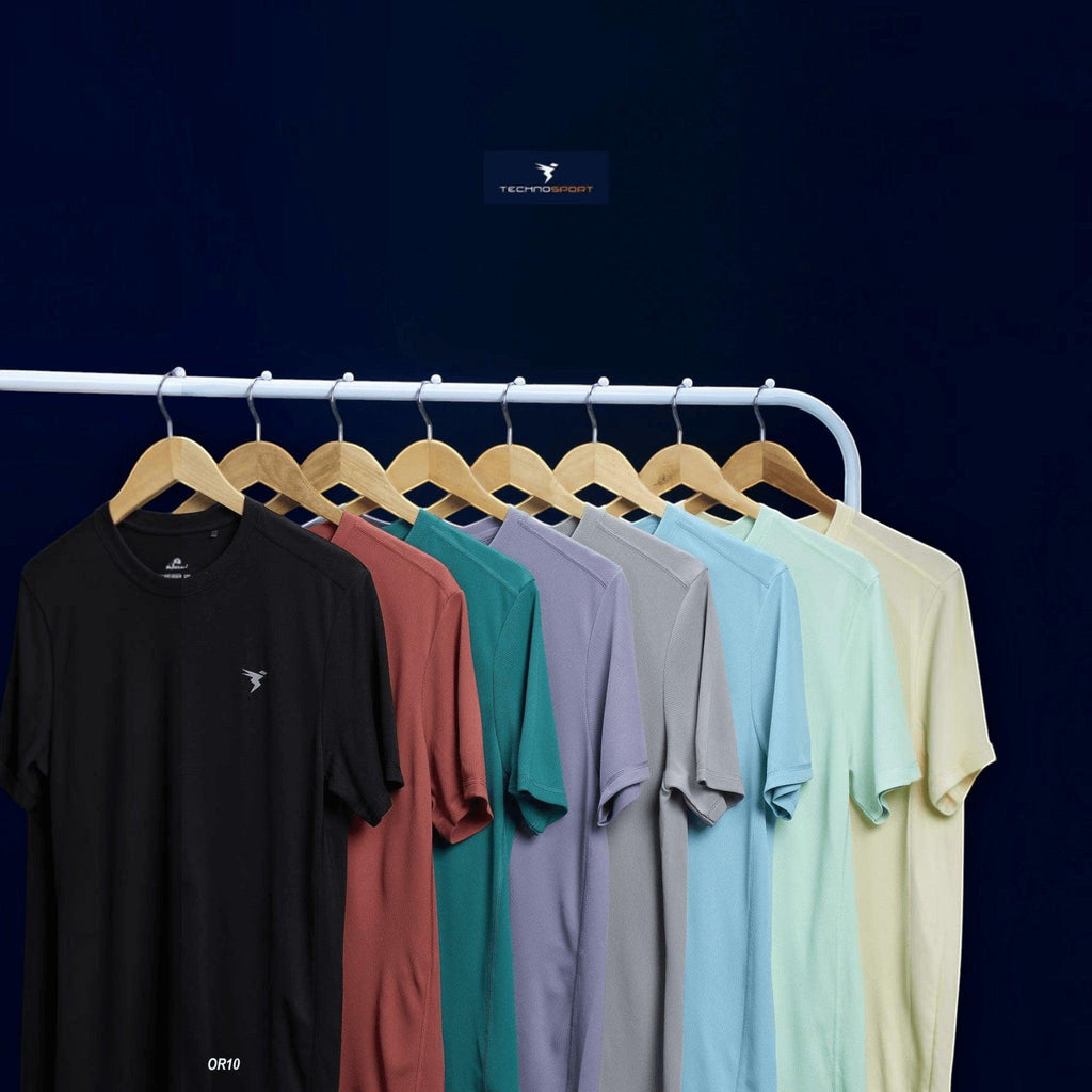 City Center Technosport TechnoCool+ slim fit crew neck t-shirts in various solid colours hanging on a rack
