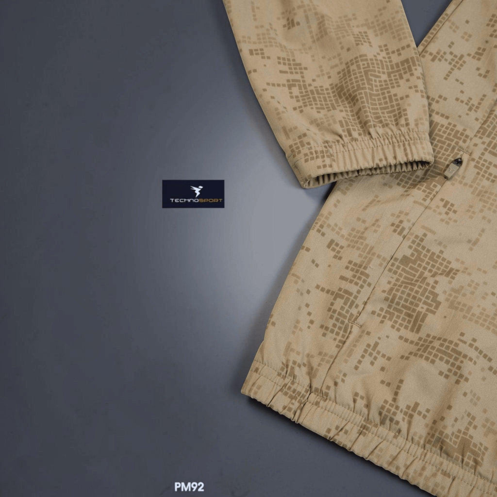 City Center Technosport tan digital camouflage print athletic jacket with elastic cuffs and moisture-wicking fabric