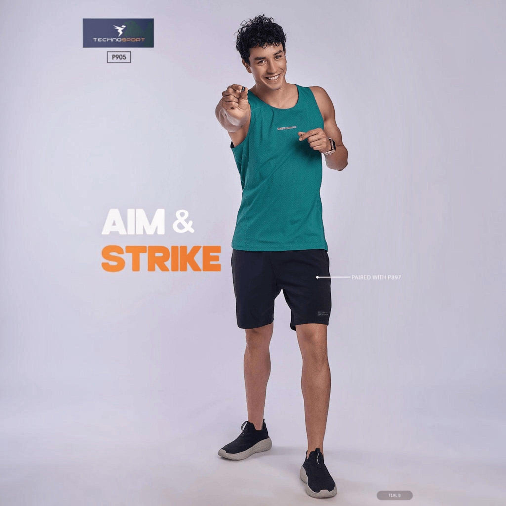 City Center TECHNOSPORT Millenova teal sleeveless athletic tank top worn by a smiling man in black shorts