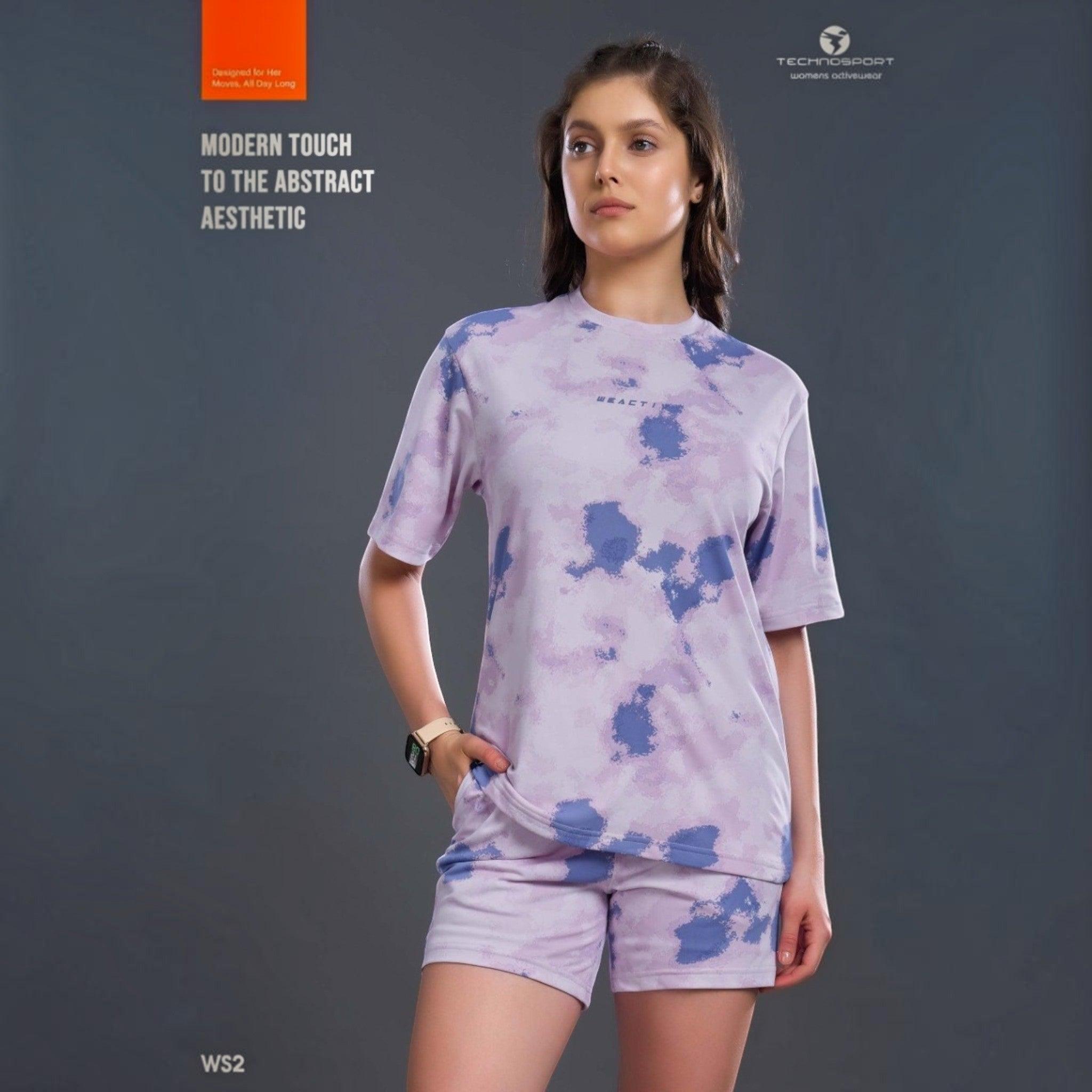 City Center Technosport womens activewear set featuring a purple and blue abstract tie-dye t-shirt and matching shorts