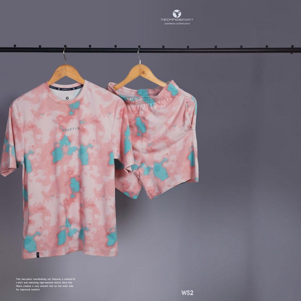 City Center Technosport womens activewear set with a pink and teal tie-dye print, featuring a t-shirt and shorts.