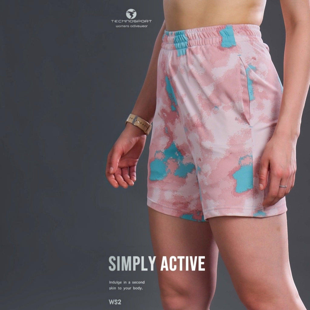 City Center Technosport women's activewear shorts in a pink and blue abstract tie-dye print with an elastic waistband.