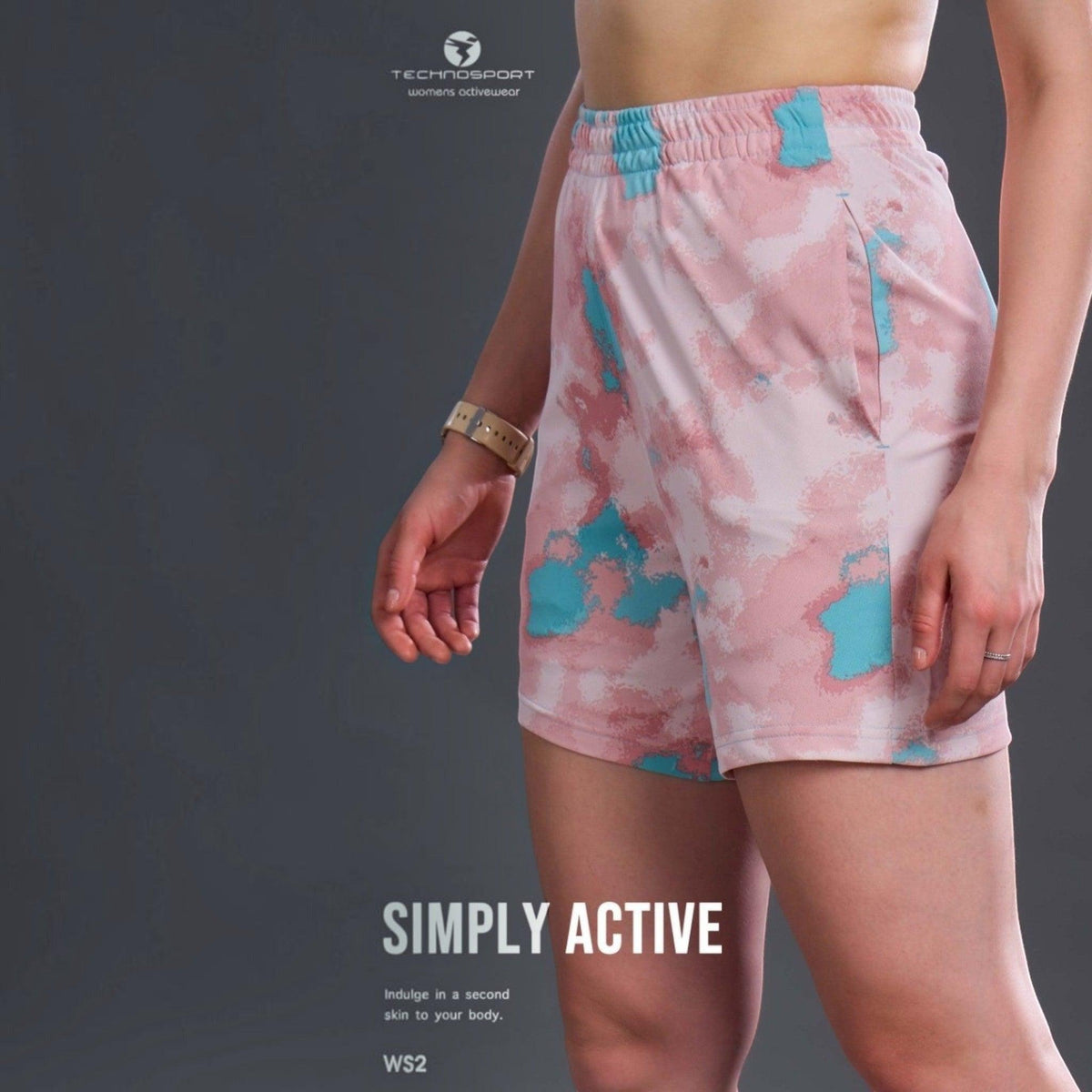 City Center Technosport women's activewear shorts in a pink and blue abstract tie-dye print with an elastic waistband.