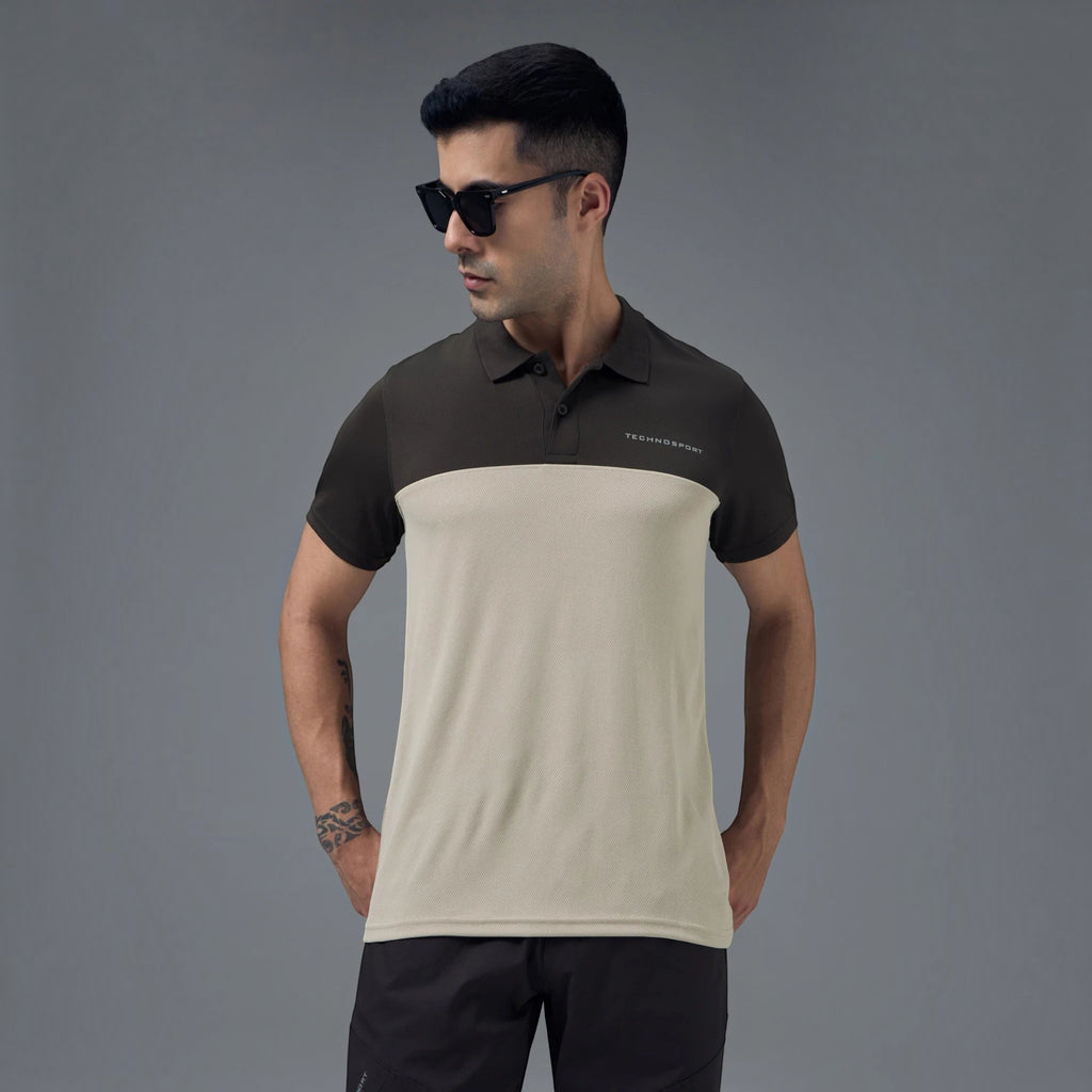 City Center model wearing a two-tone off-white and dark grey Technosport performance polo shirt with sunglasses.