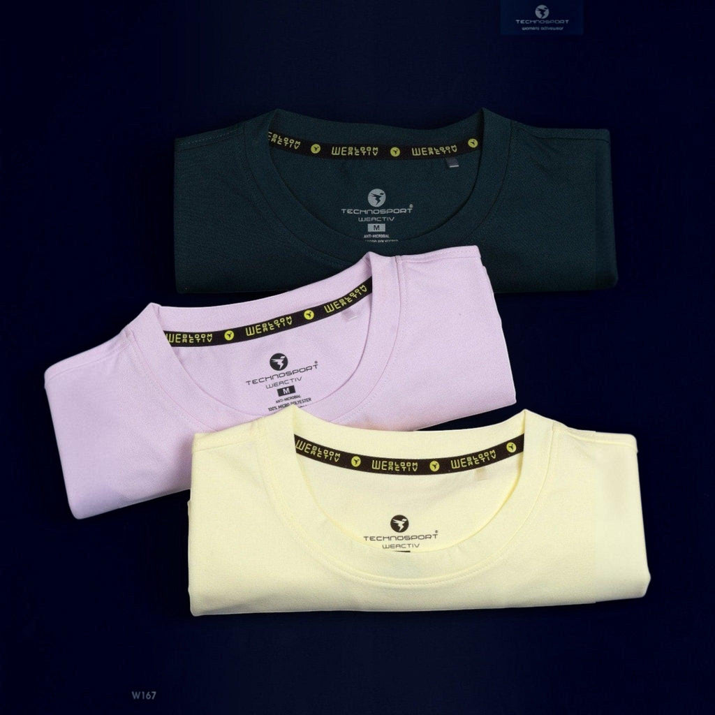 City Center Technosport women's crew neck t-shirts in dark green, light pink, and pale yellow moisture-wicking fabric.