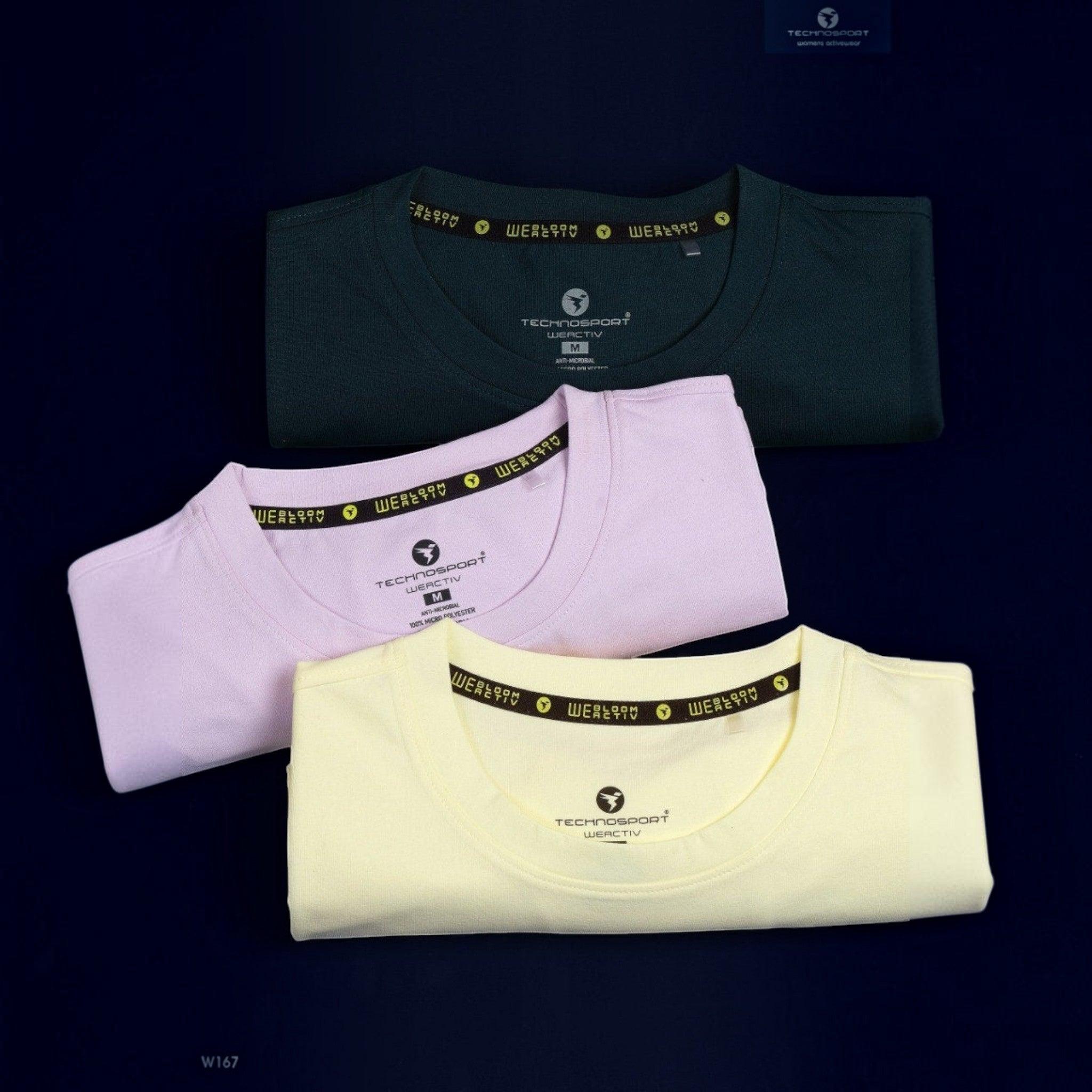 City Center Technosport women's crew neck t-shirts in dark green, light pink, and pale yellow moisture-wicking fabric.