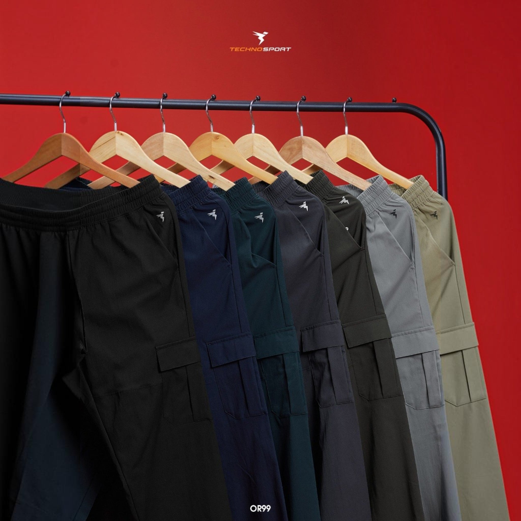 City Center Technosport TS Flexi solid woven cargo pants in various neutral colours hanging on a rack.