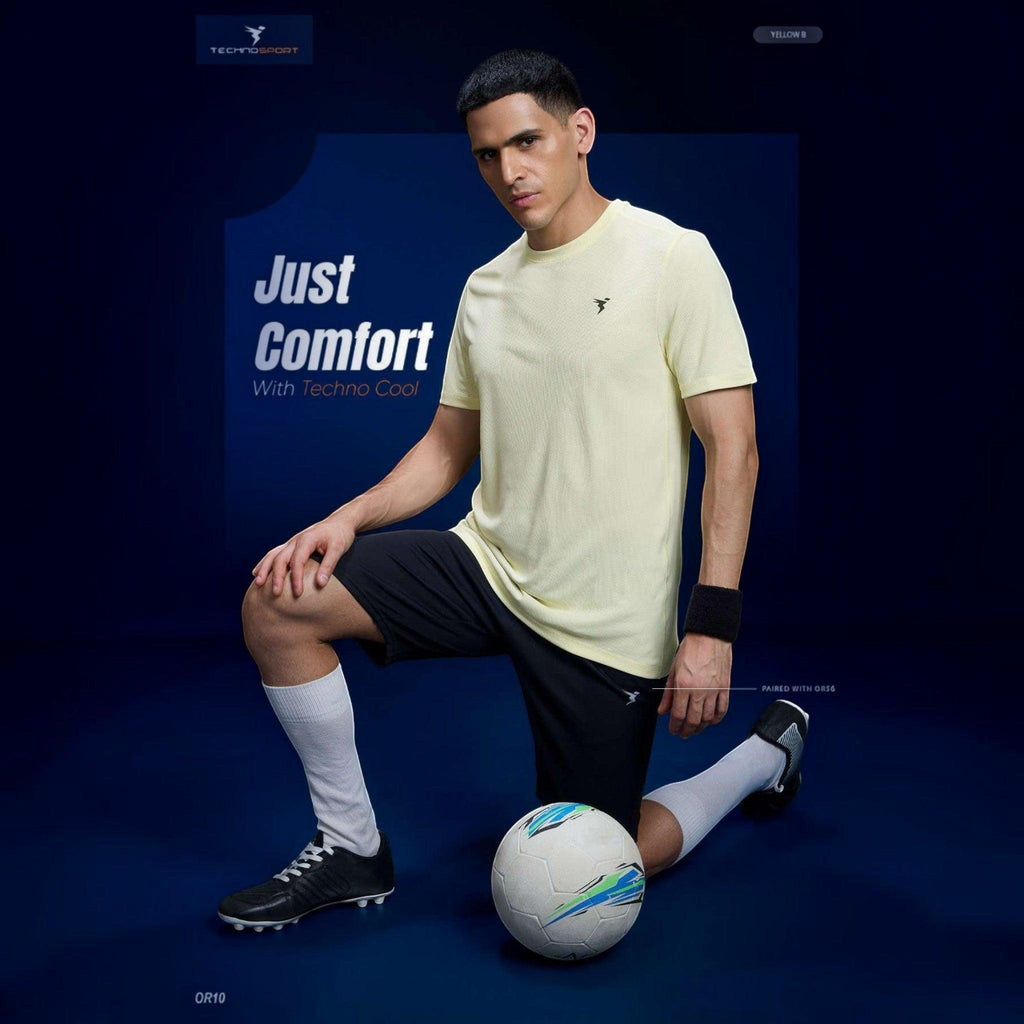 City Center model wearing a pale yellow Technosport TechnoCool+ slim fit crew neck t-shirt with a soccer ball