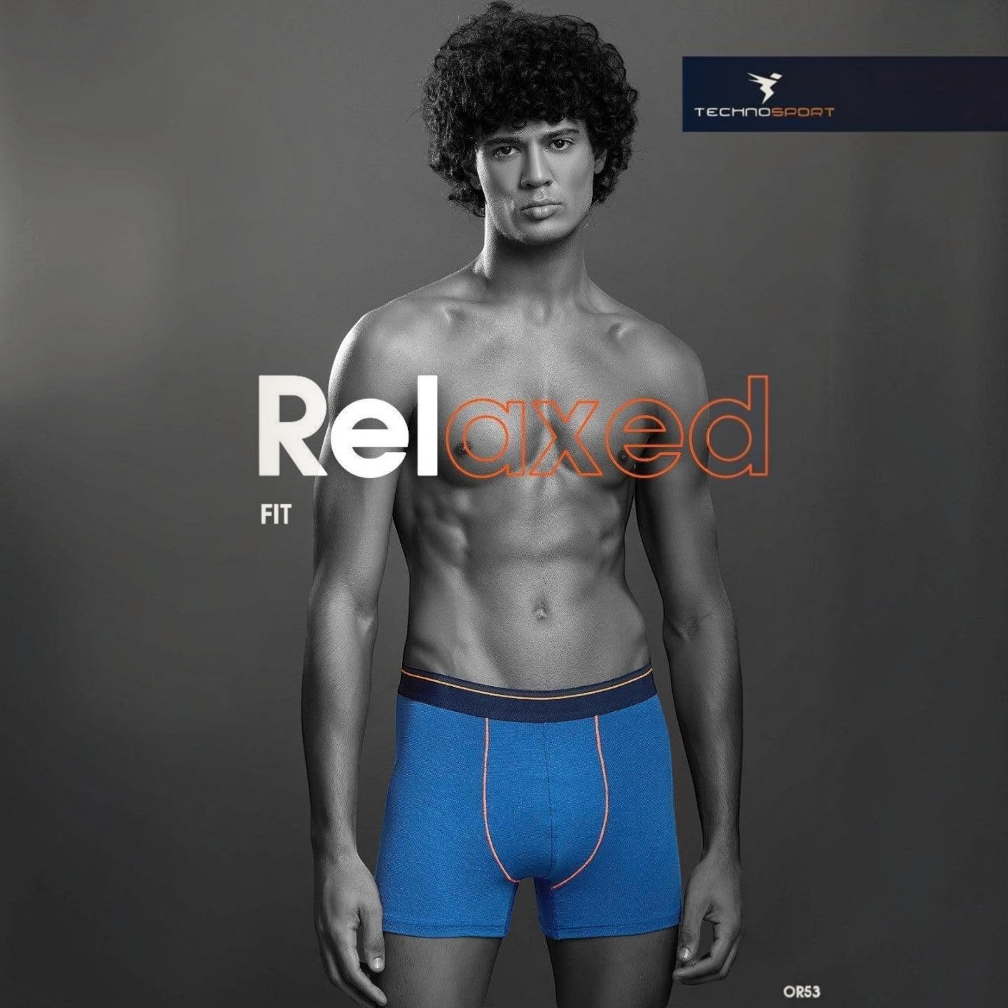City Center Technosports OR53 blue athletic men's trunk with orange trim worn by a model in a studio setting